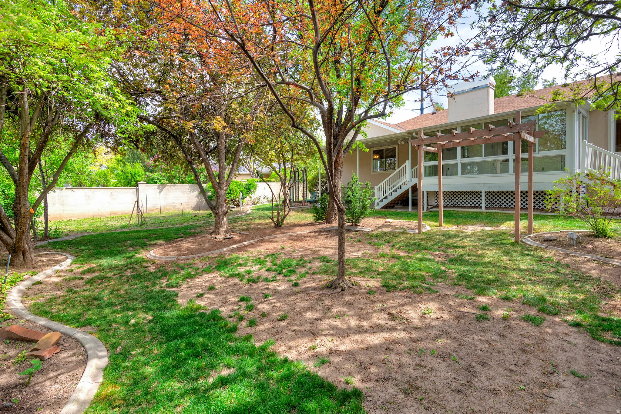 Fenced yard with stairway