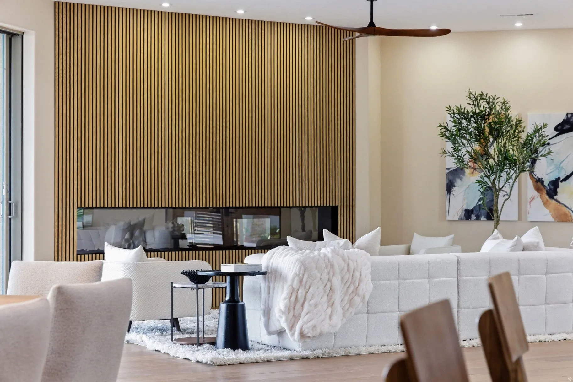 Living room featuring wood finished floors and recessed lighting