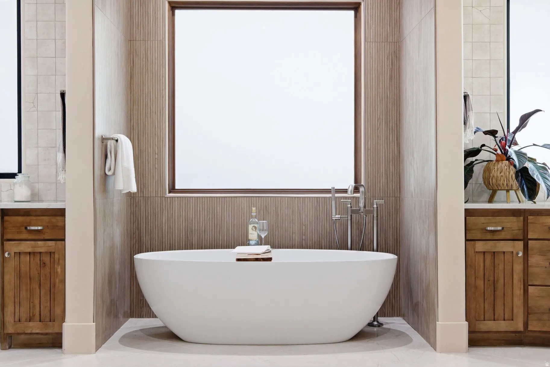Bathroom featuring vanity and a freestanding tub
