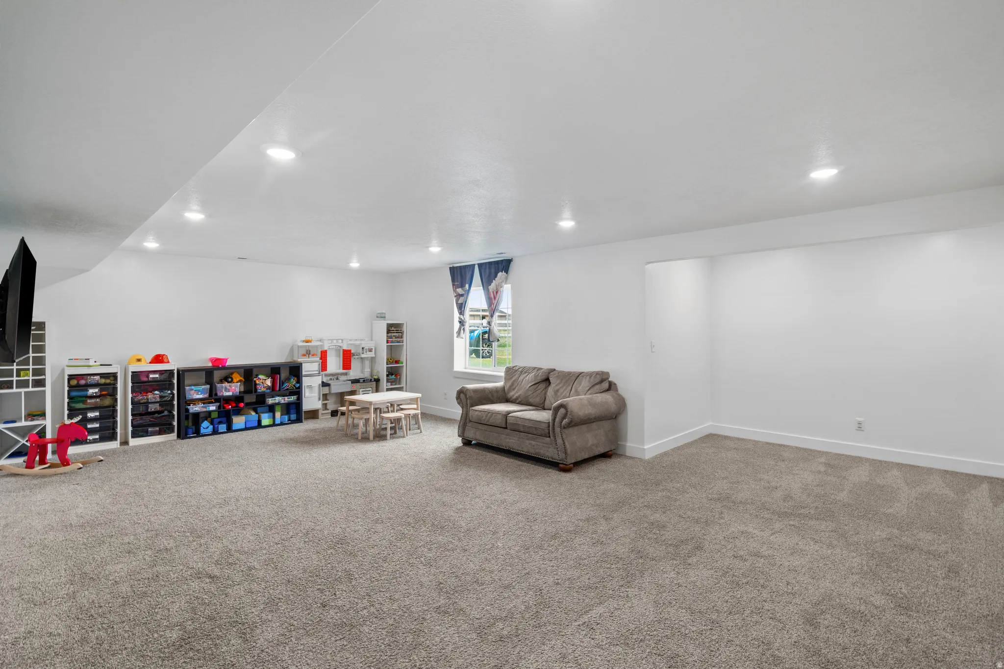 Rec room with carpet and recessed lighting