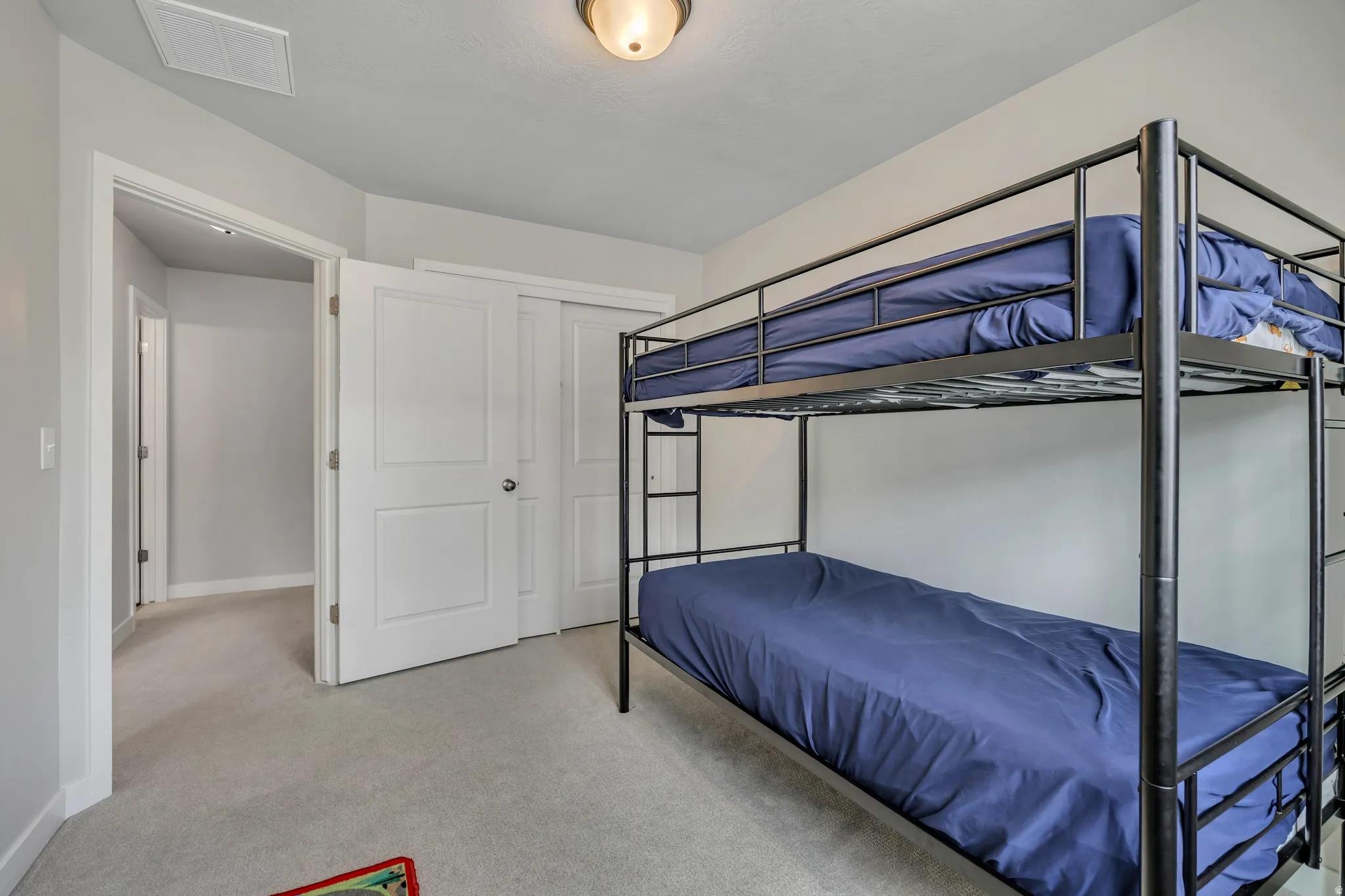 Bedroom #3 with double door closet.