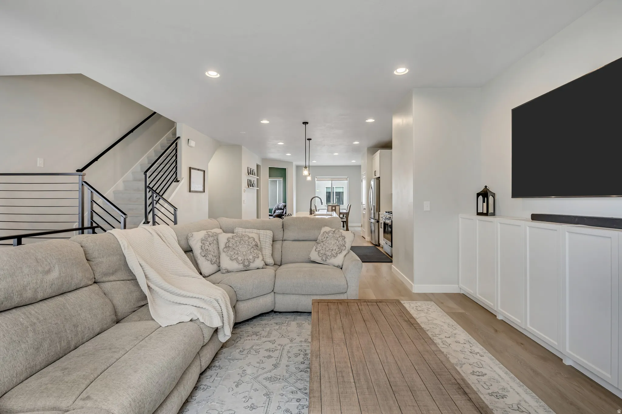 Family room looking into the kitchen and upstairs bedrooms.