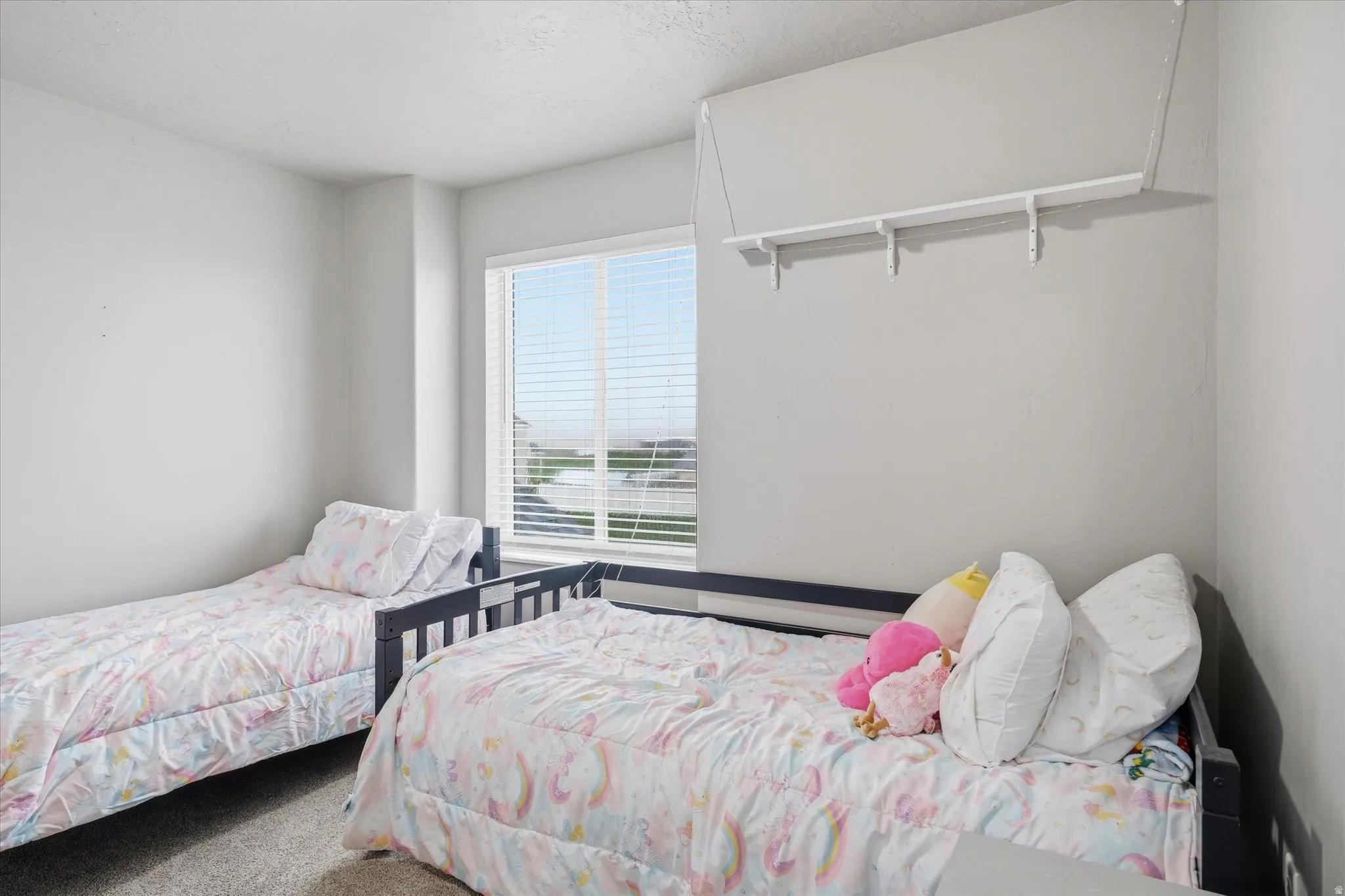 Bedroom featuring carpet flooring