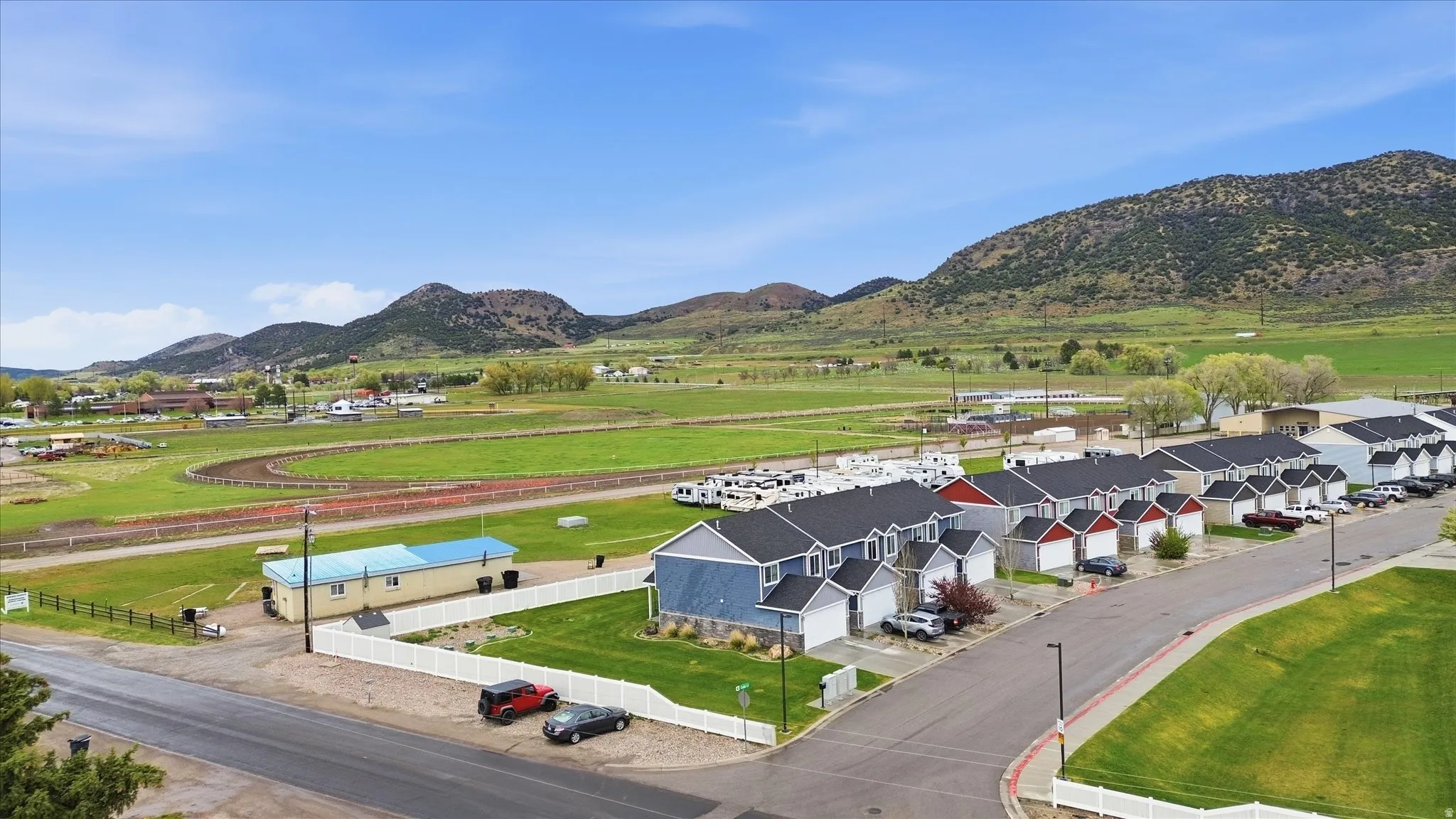 Aerial view of community and a mountain backdrop