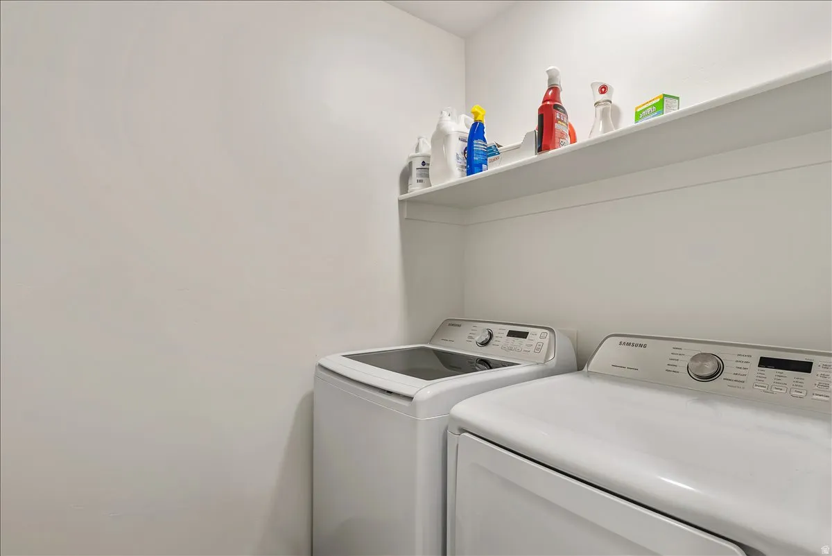 Laundry area featuring independent washer and dryer