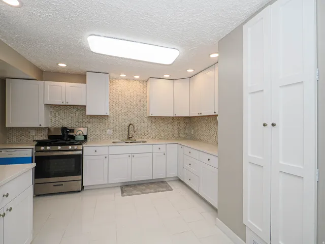Large kitchen with new cabinets