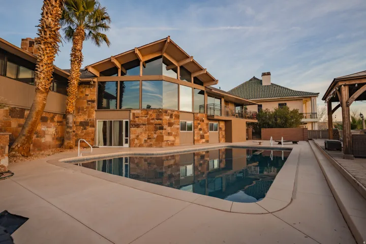 Community pool with a patio and a gazebo