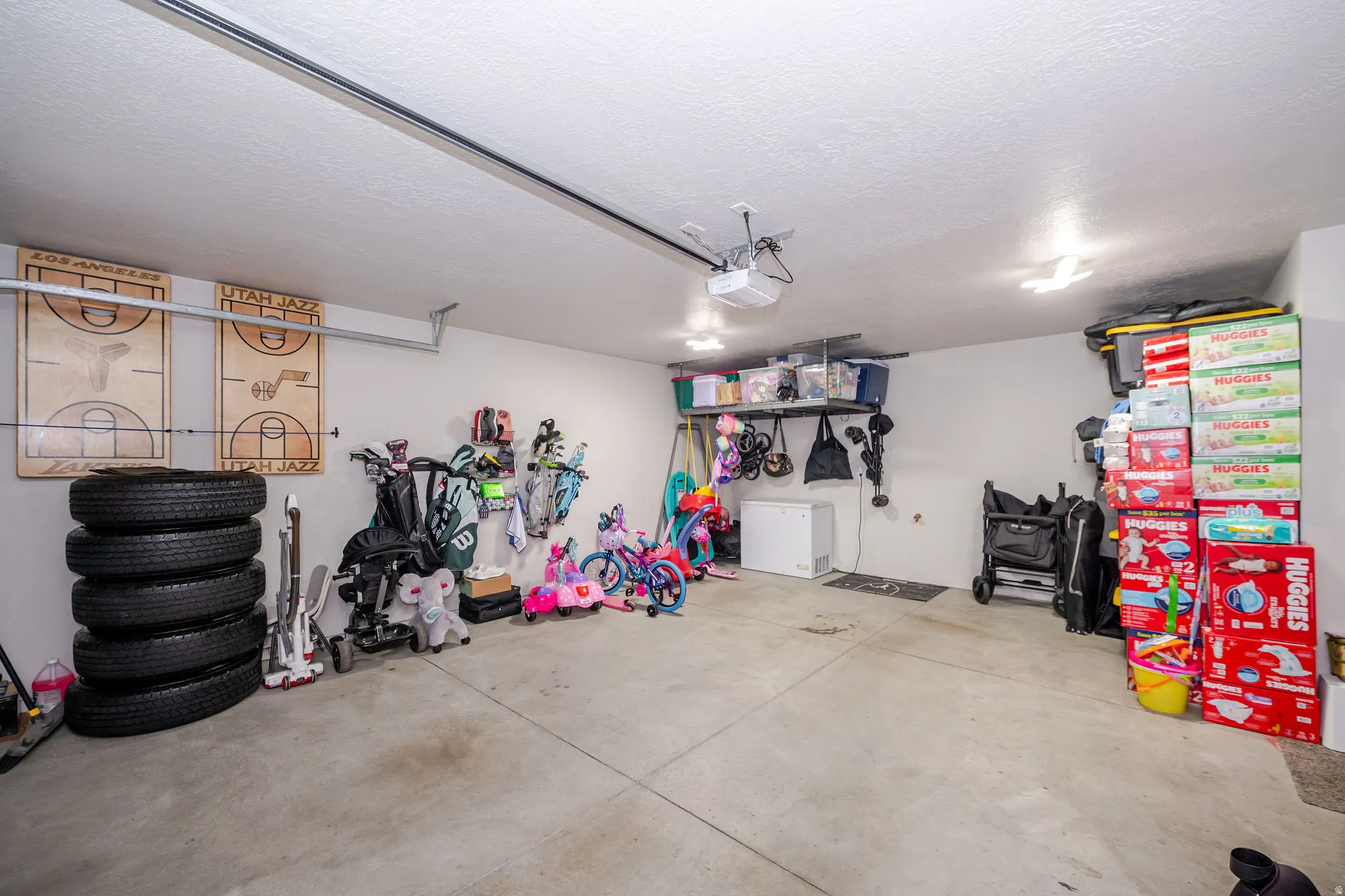 Garage with fridge and a garage door opener