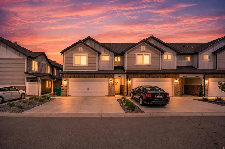 Craftsman inspired home with board and batten siding, concrete driveway, and a garage