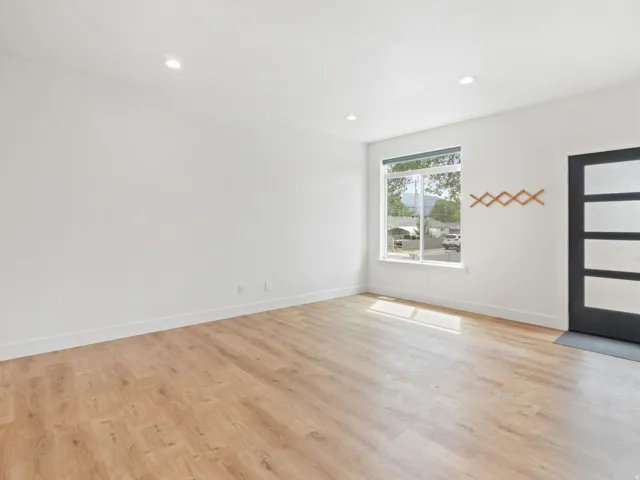 Entrance foyer featuring light wood-style flooring and recessed lighting
