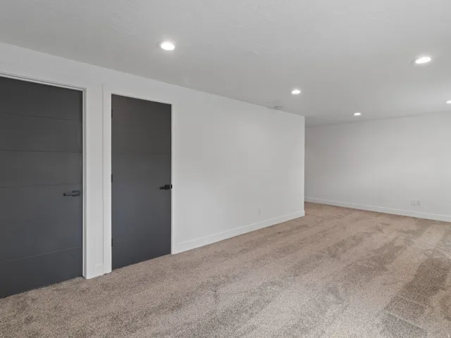 Below grade area featuring carpet and recessed lighting