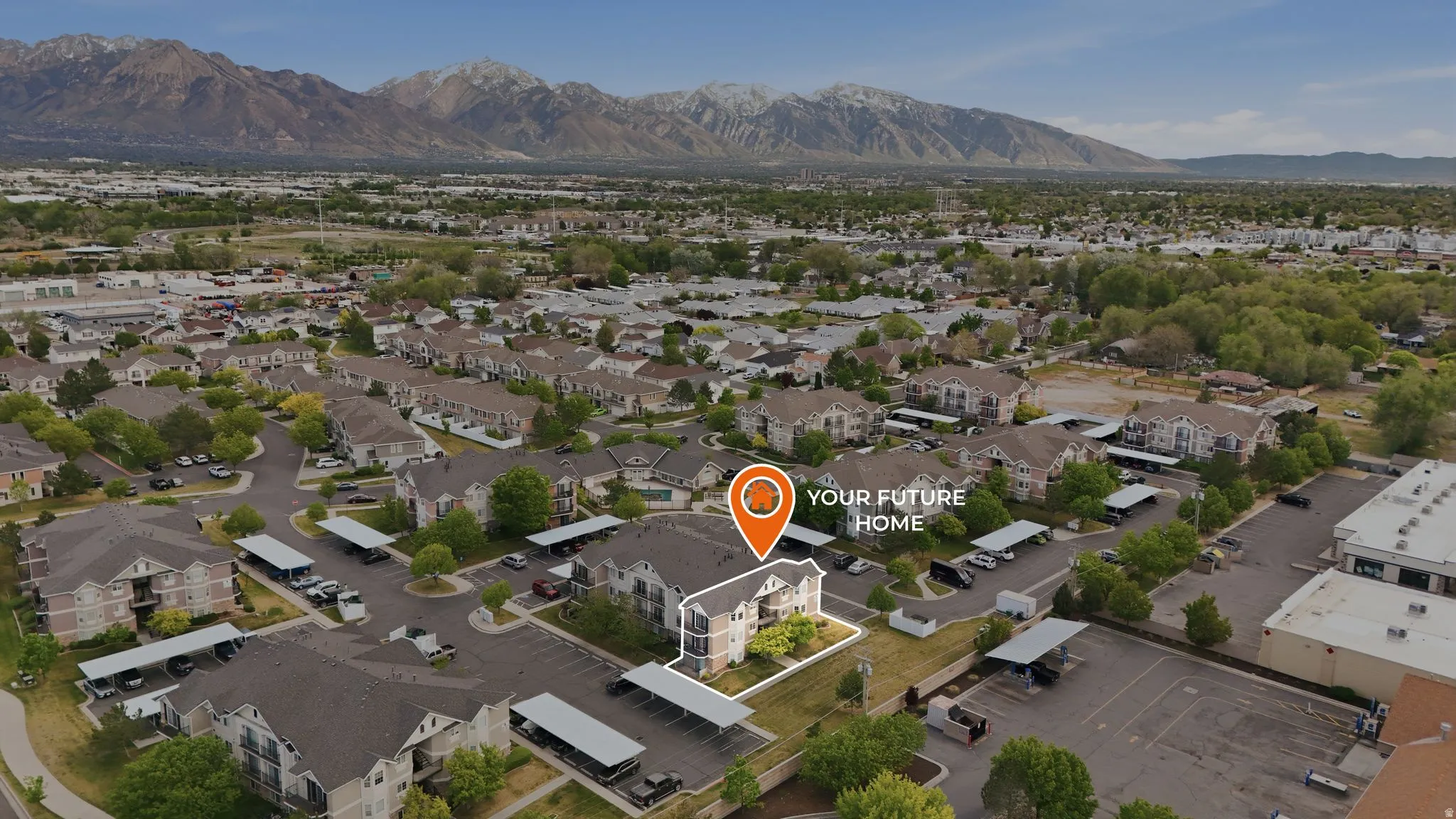 Aerial view of residential area with a mountain backdrop