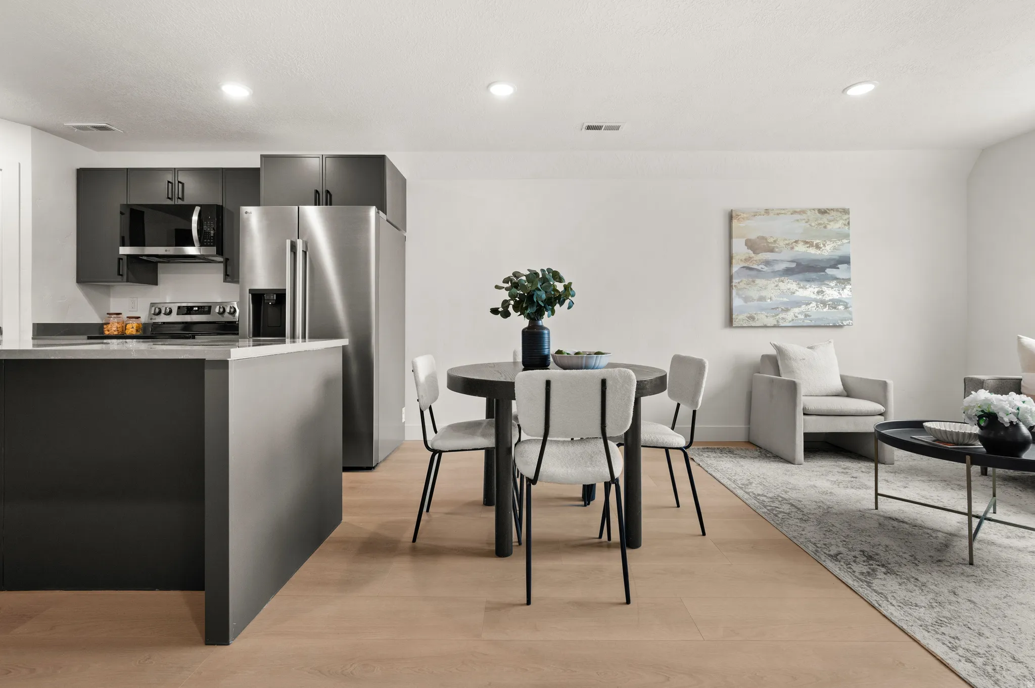 Dining room featuring light wood-style floors and recessed lighting