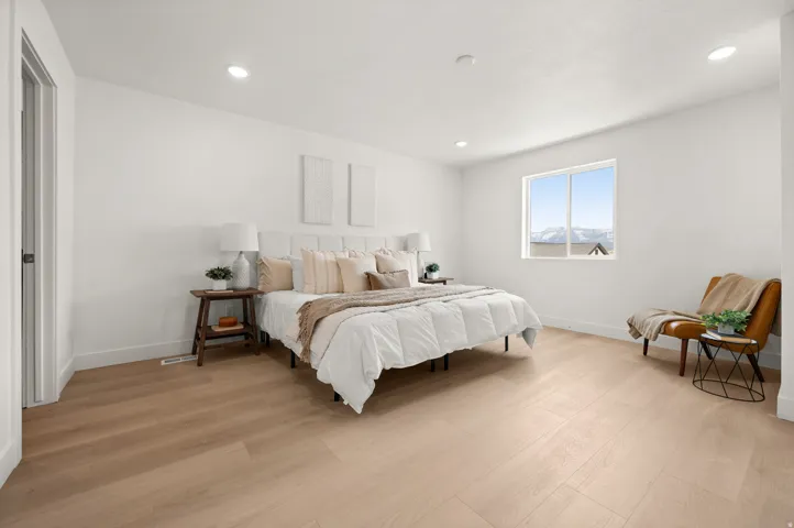 Bedroom featuring light wood-style flooring and recessed lighting