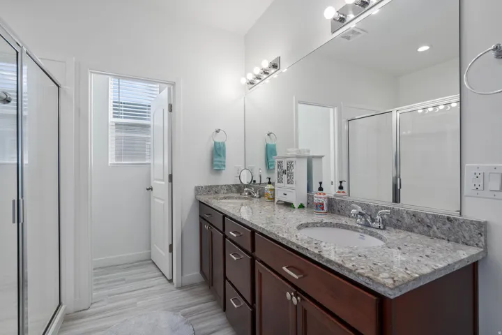 Primary Full bathroom with double vanity and oversized shower