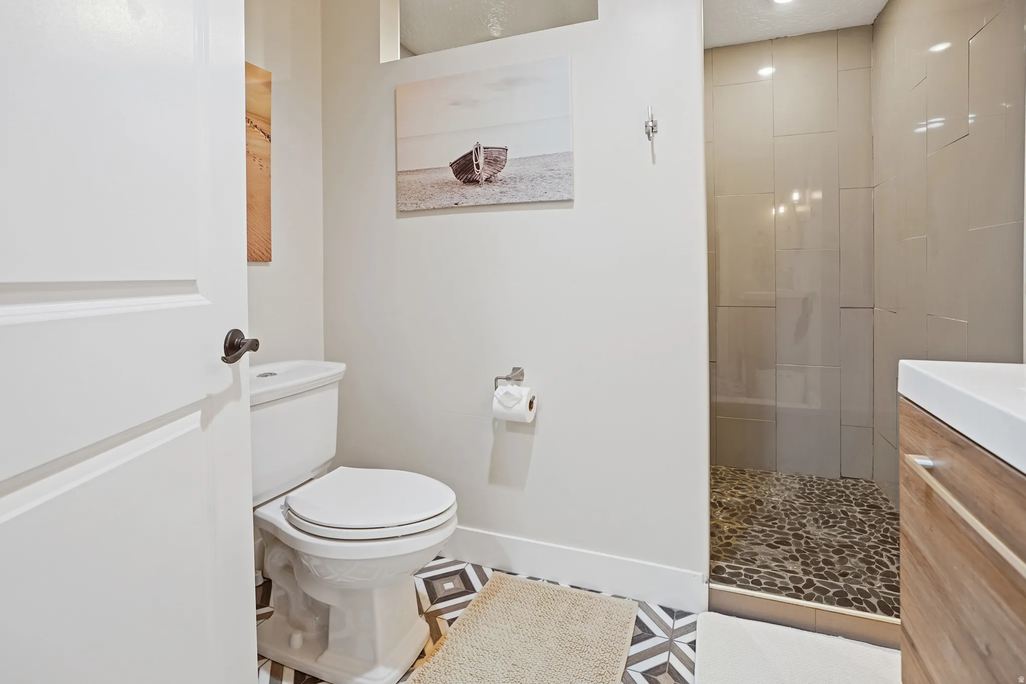 Full bathroom featuring vanity and walk in shower