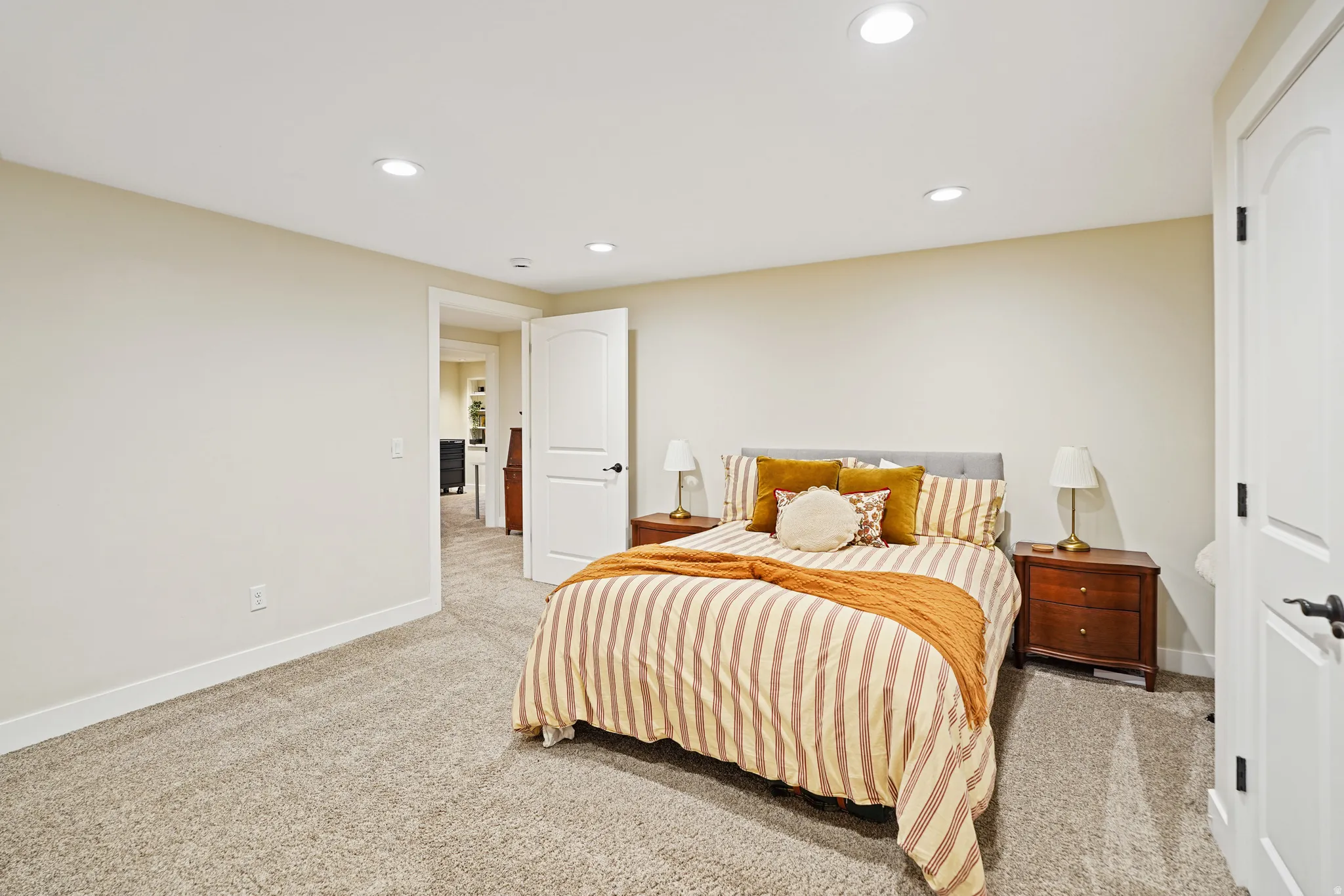 Bedroom featuring recessed lighting and light colored carpet