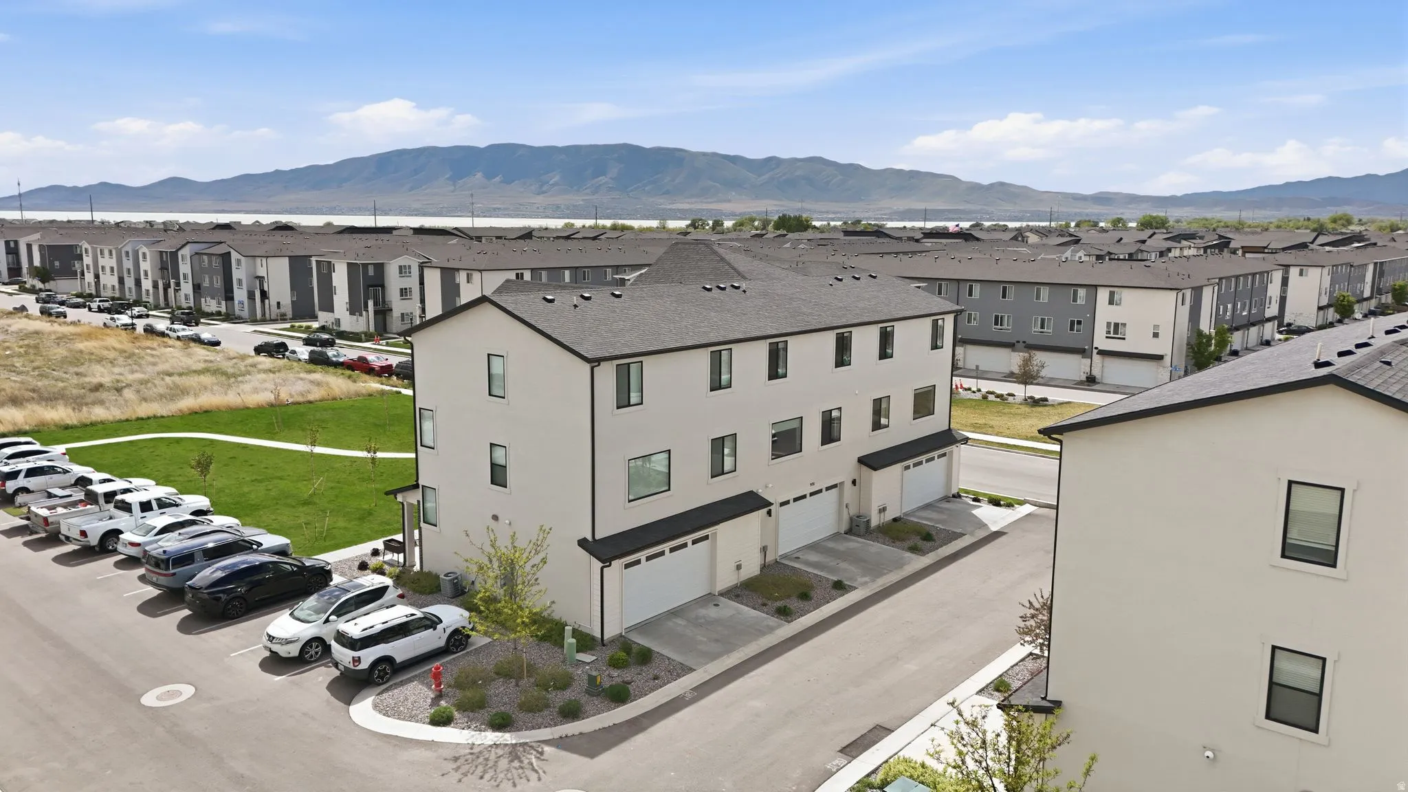 Aerial view of residential area with a mountainous background