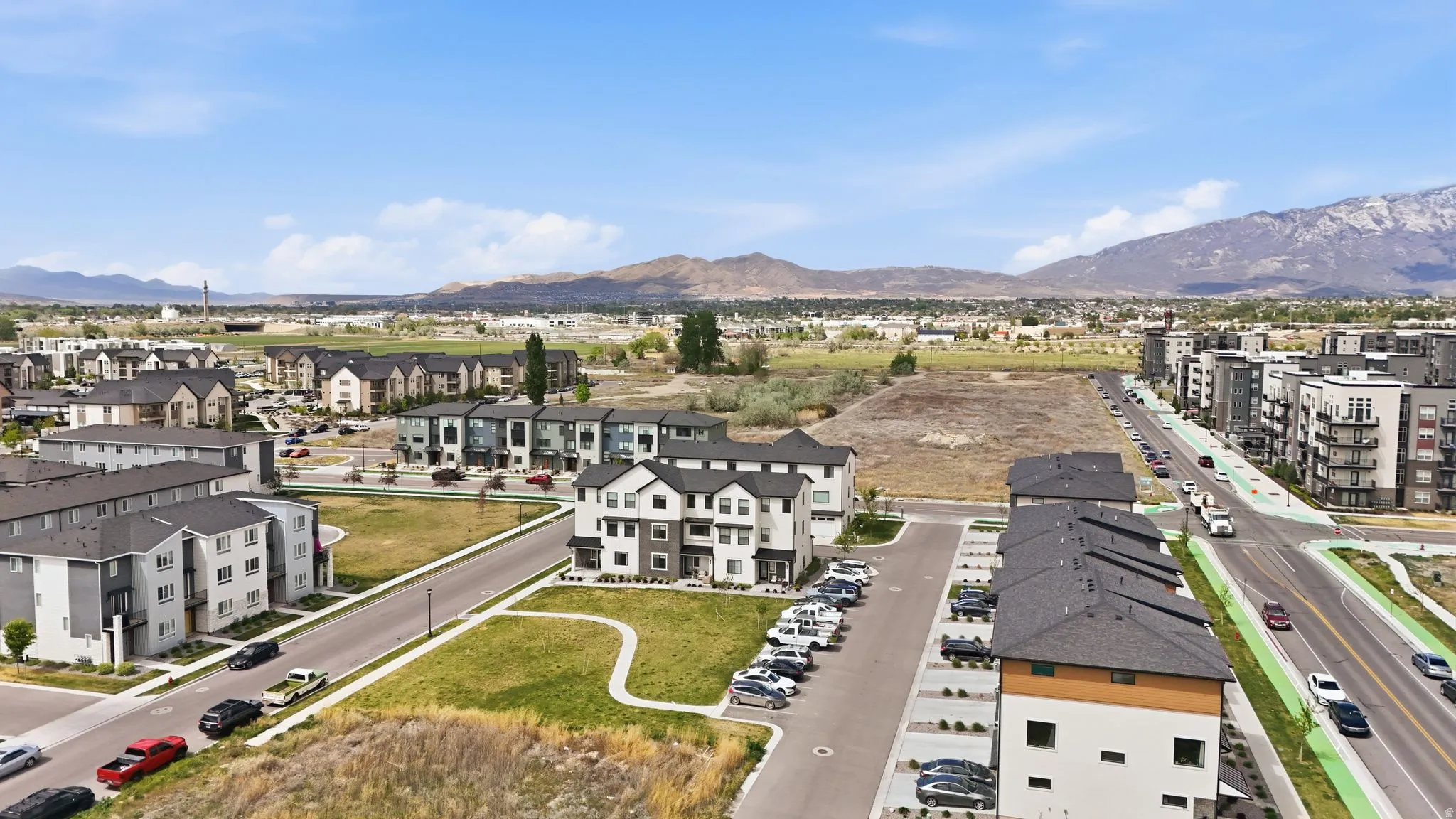 Aerial view of residential area featuring mountains