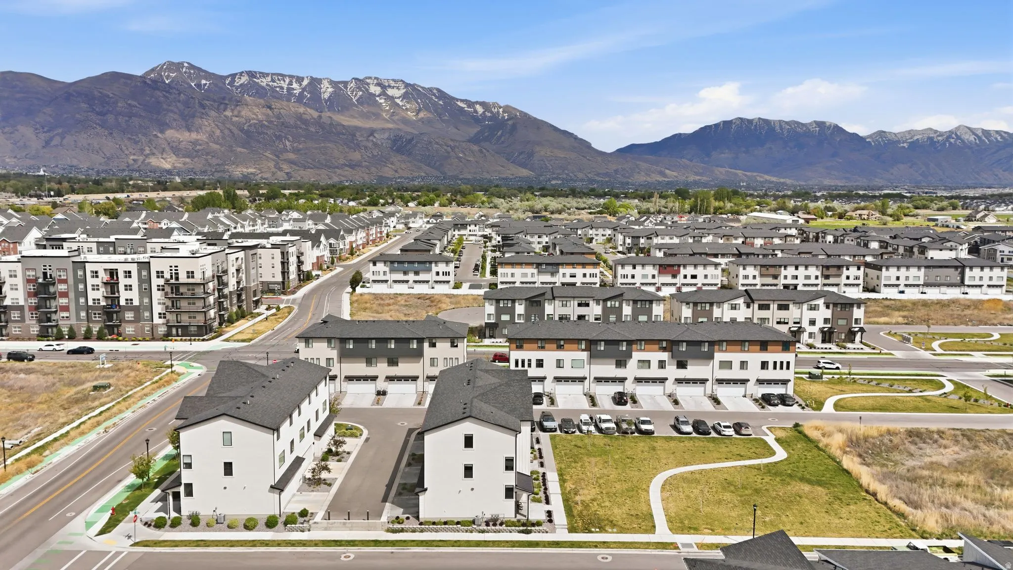 Aerial view of residential area with a mountainous background