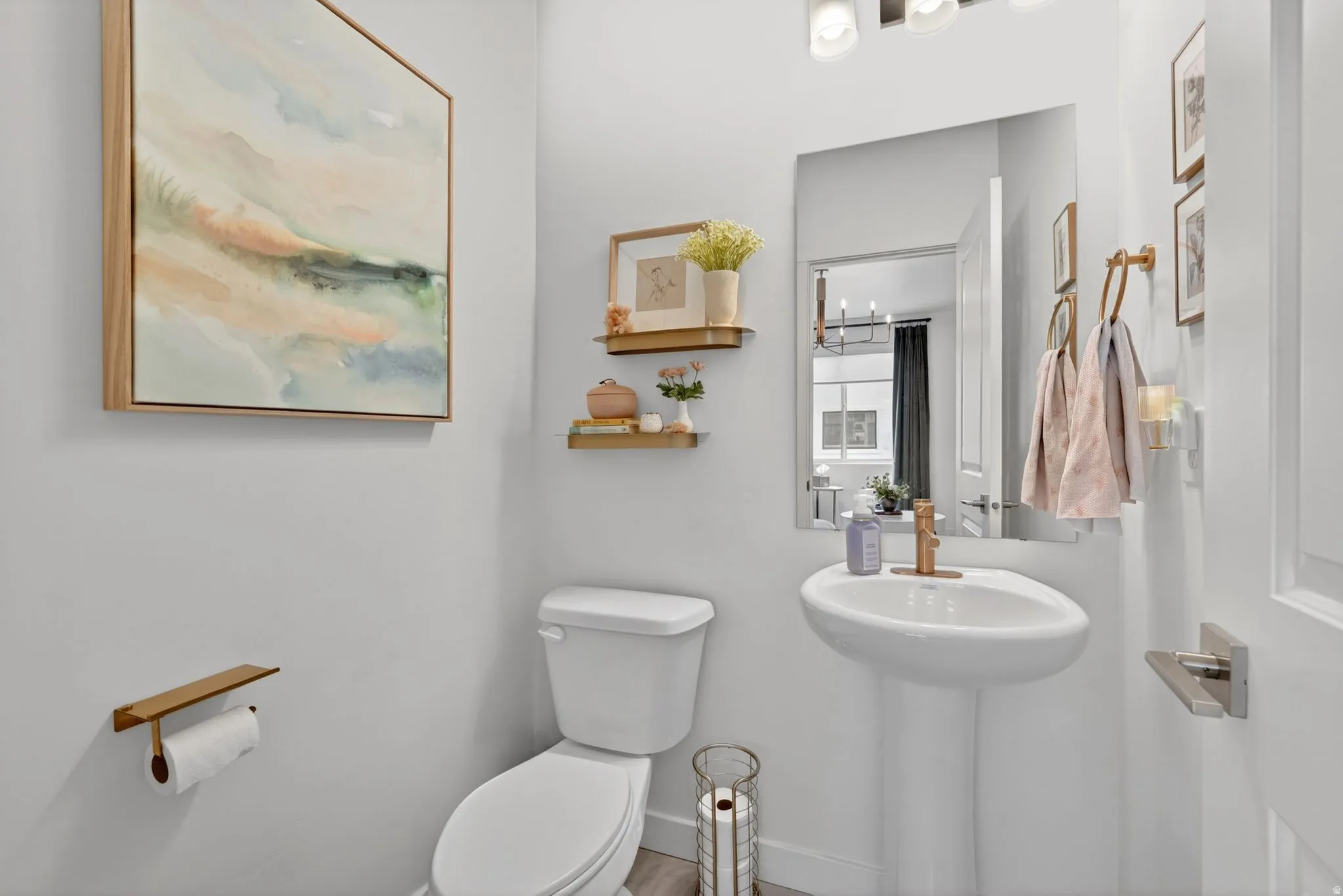 Half bathroom featuring toilet and baseboards located on 2nd floor