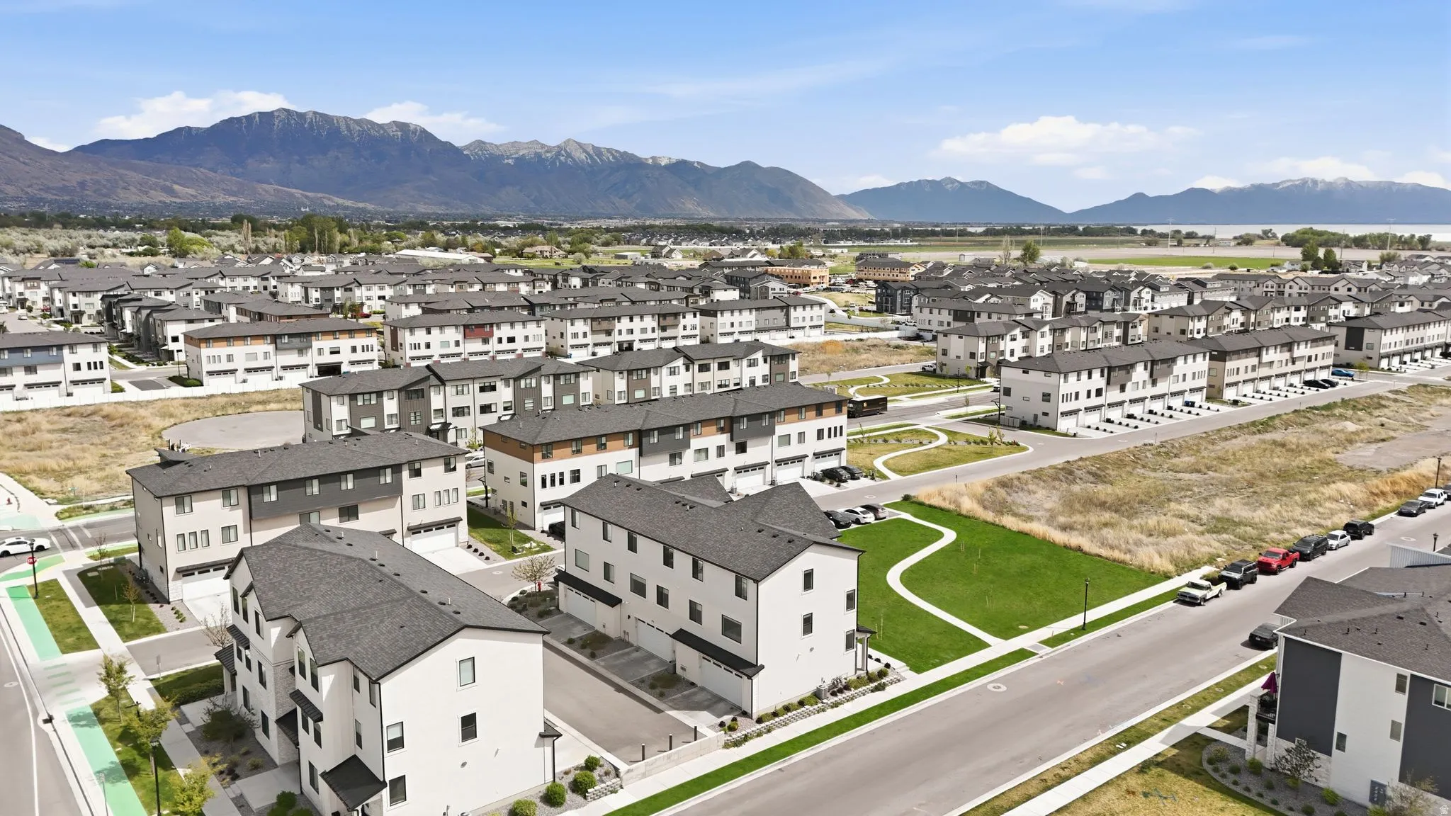 Aerial view of residential area with a mountainous background