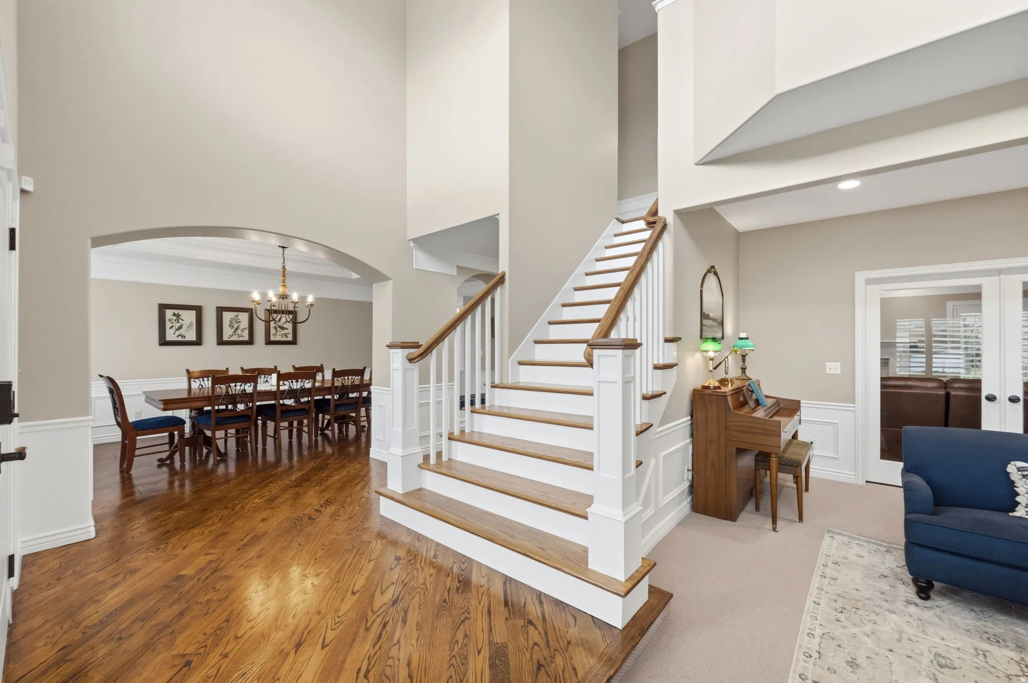 Grand entry with hardwood stairs