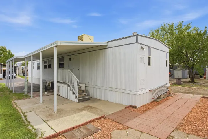 Back door with covered patio area