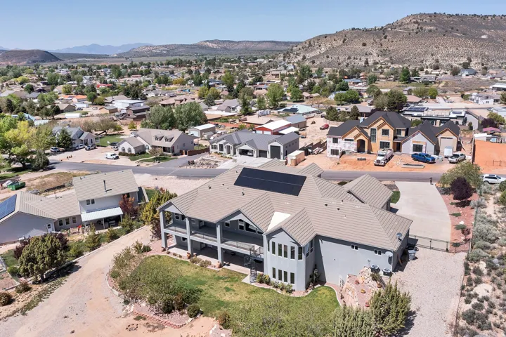 Aerial view of residential area with a mountainous background