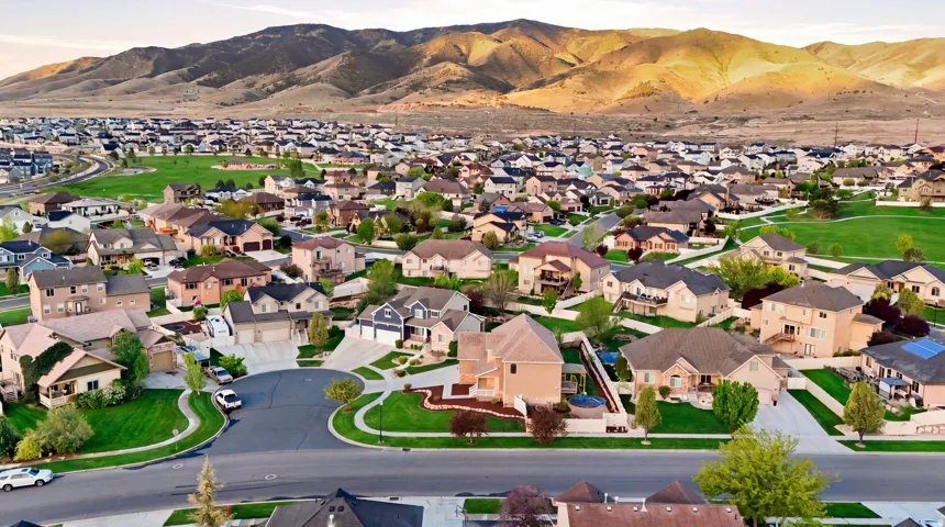 Aerial perspective of suburban area with mountains