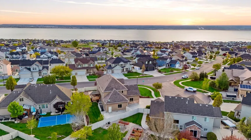 Aerial view at dusk of a residential view and a water view