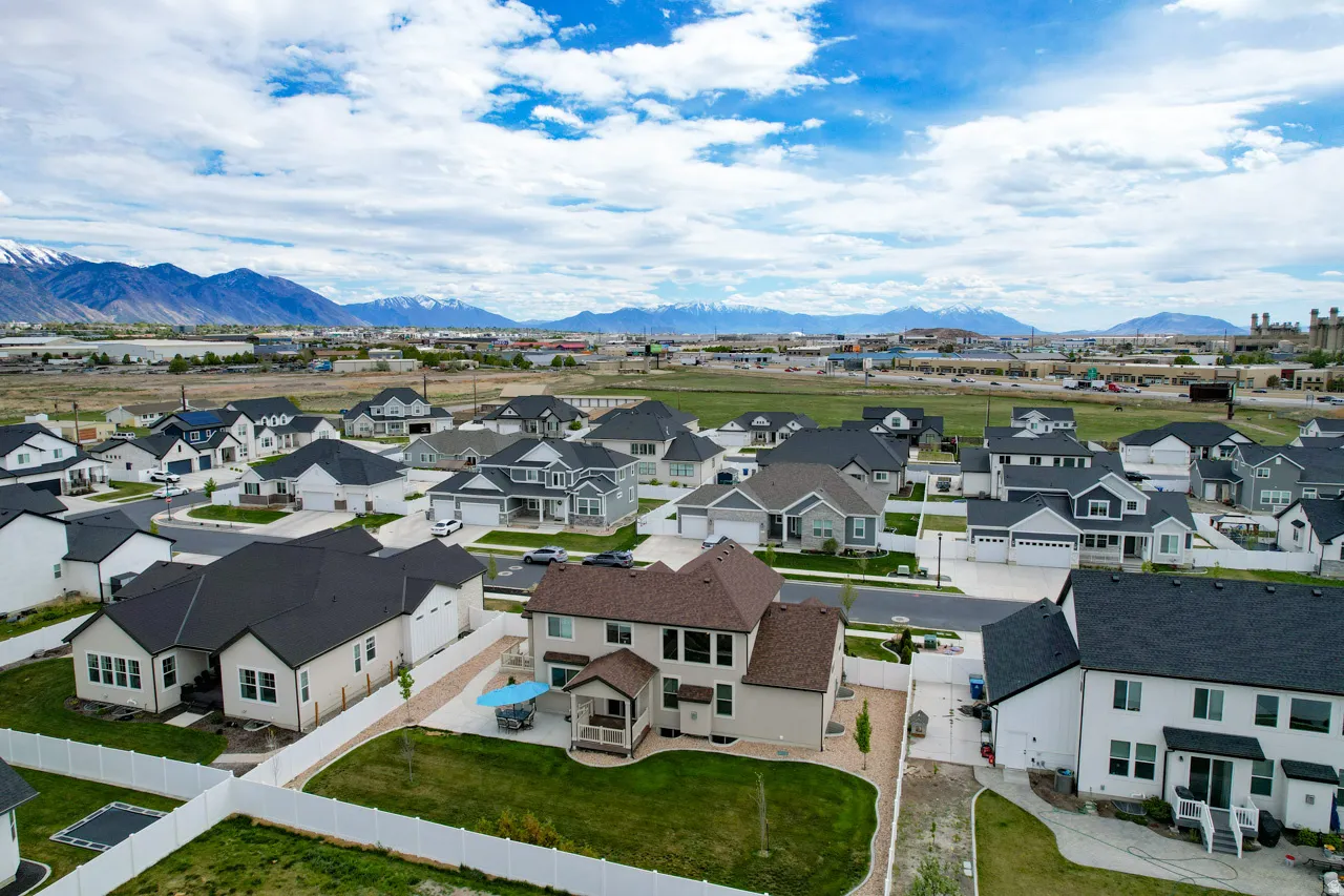 Aerial view of residential area with mountains