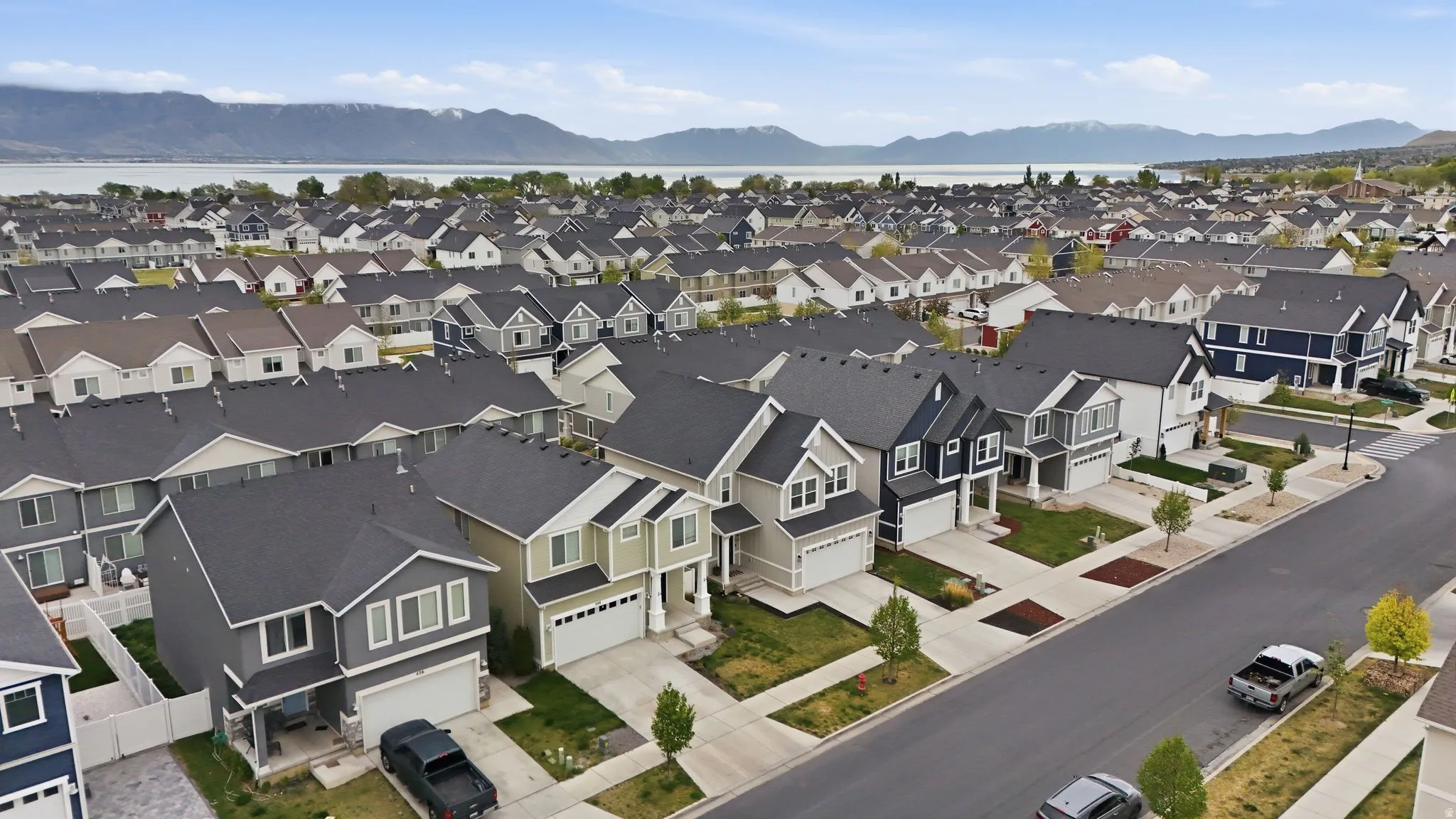Aerial view of residential area with a mountain backdrop
