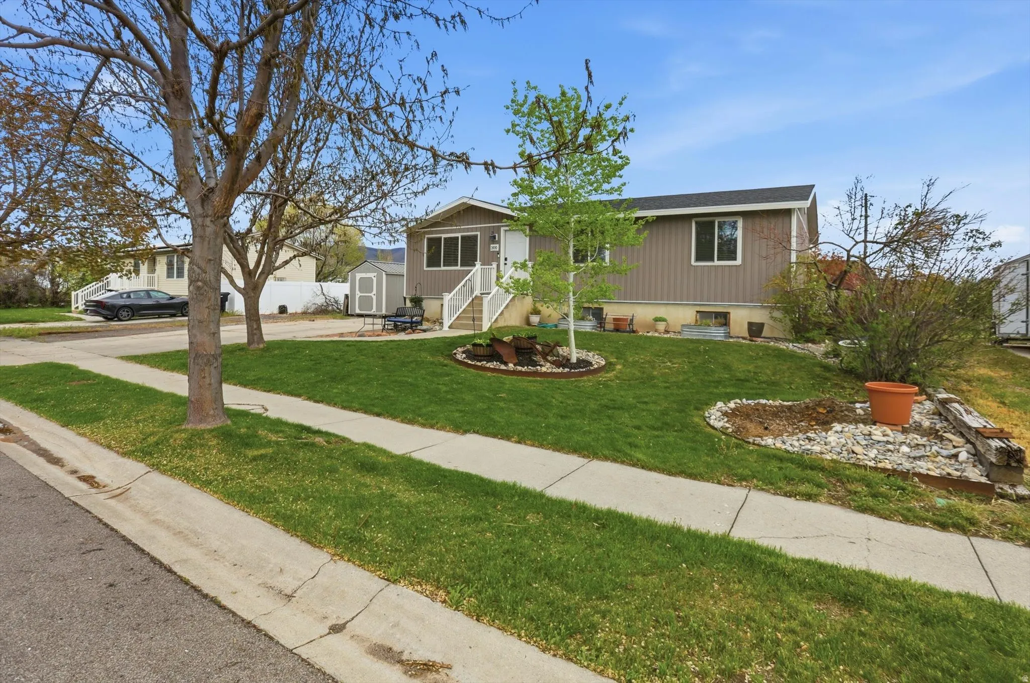 Single story home featuring a front yard