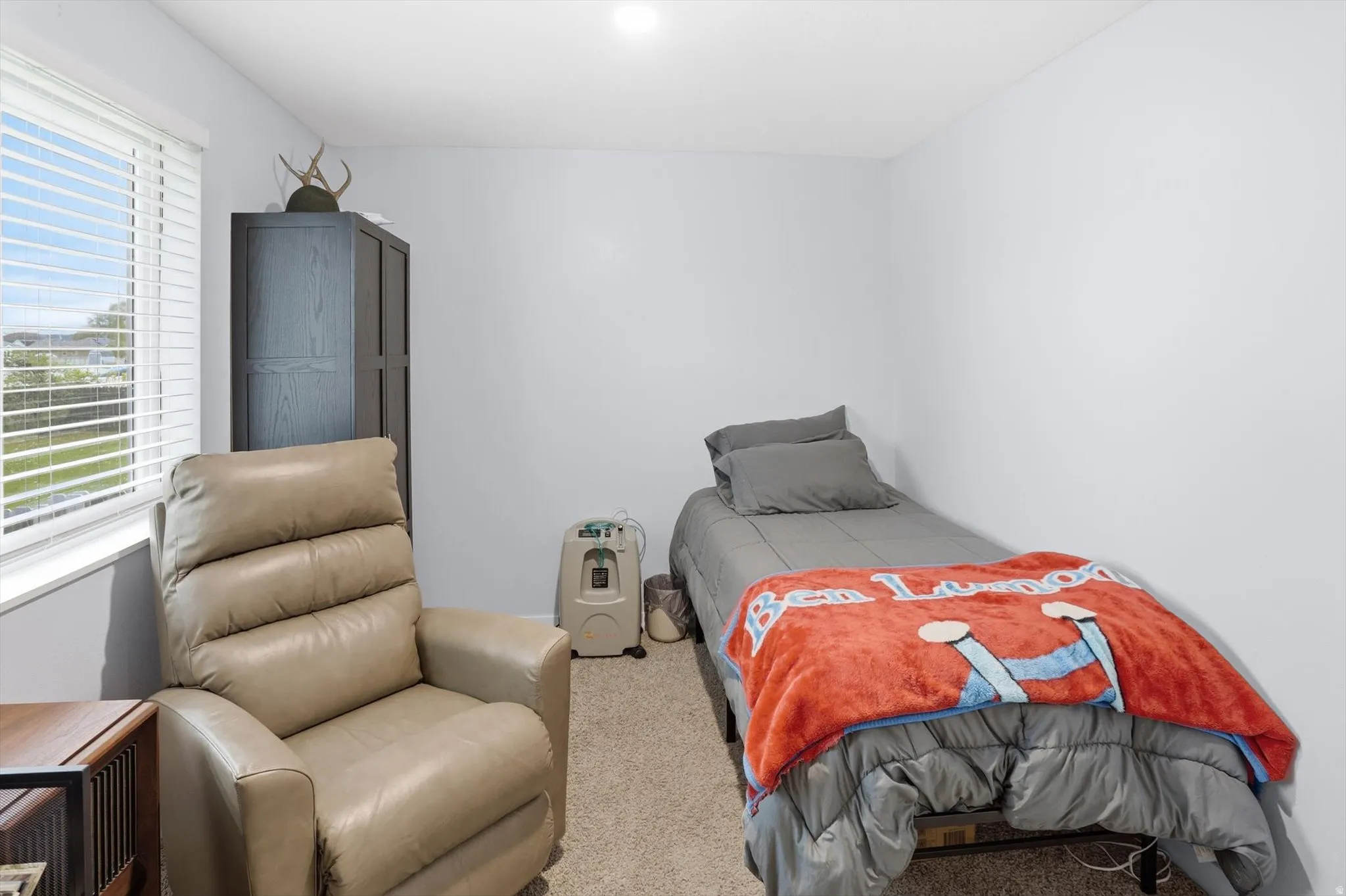 Bedroom with carpet