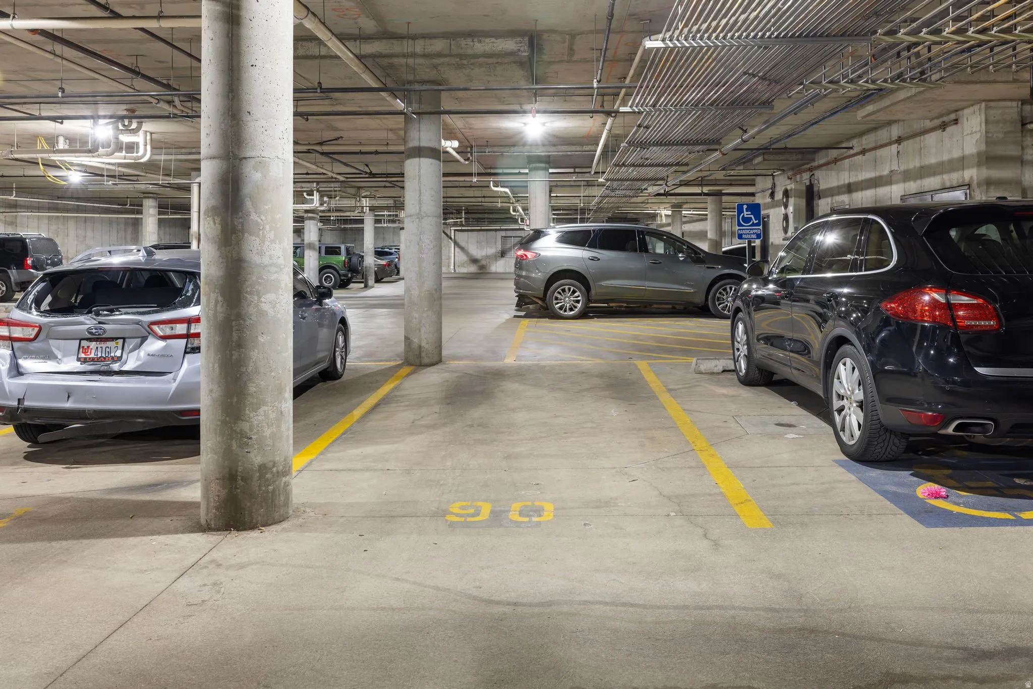 Garage featuring a parking garage