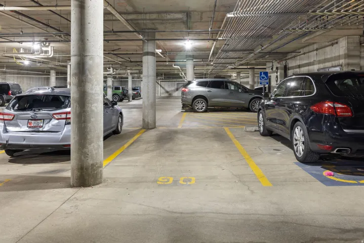 Garage featuring a parking garage