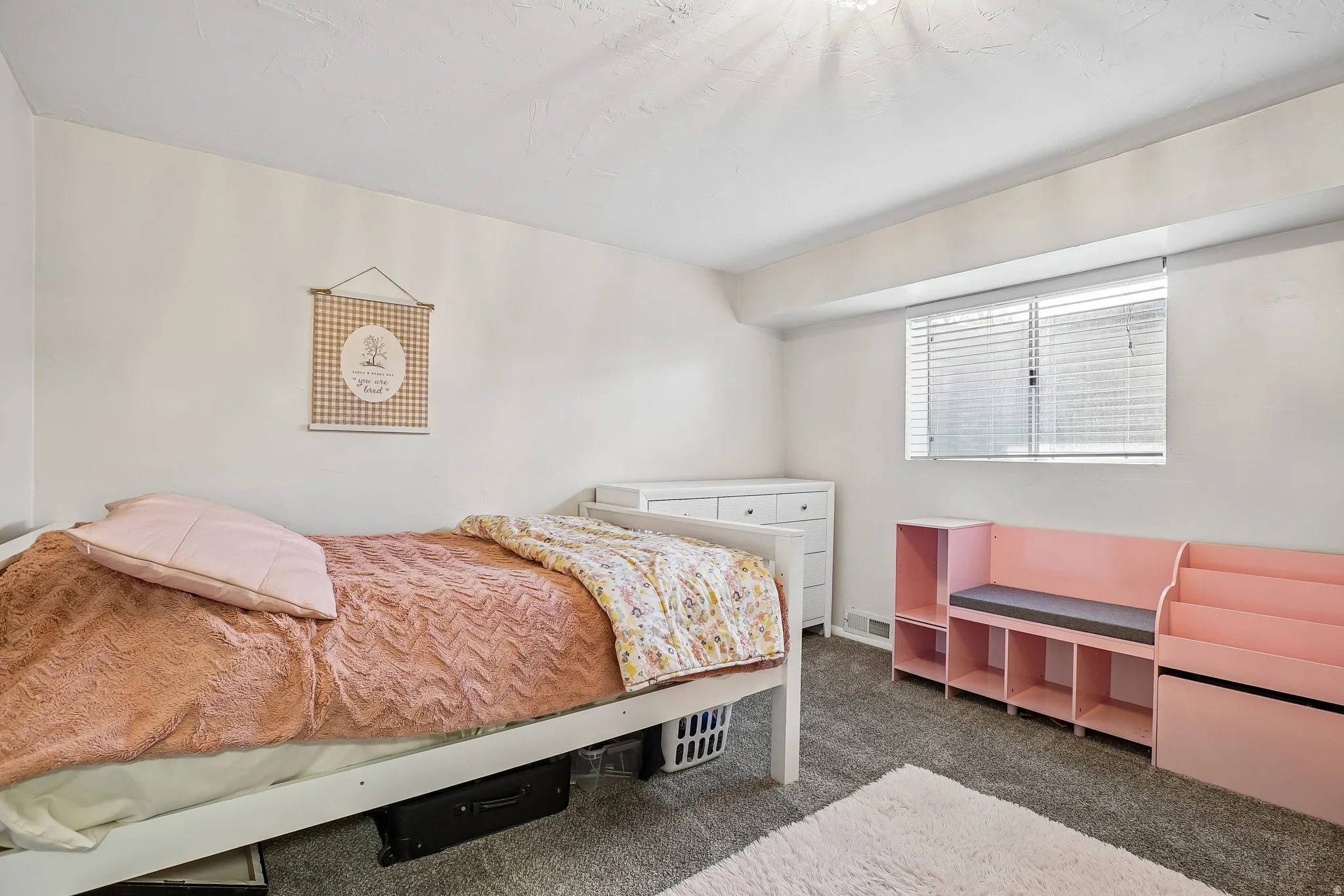 Bedroom with dark carpet