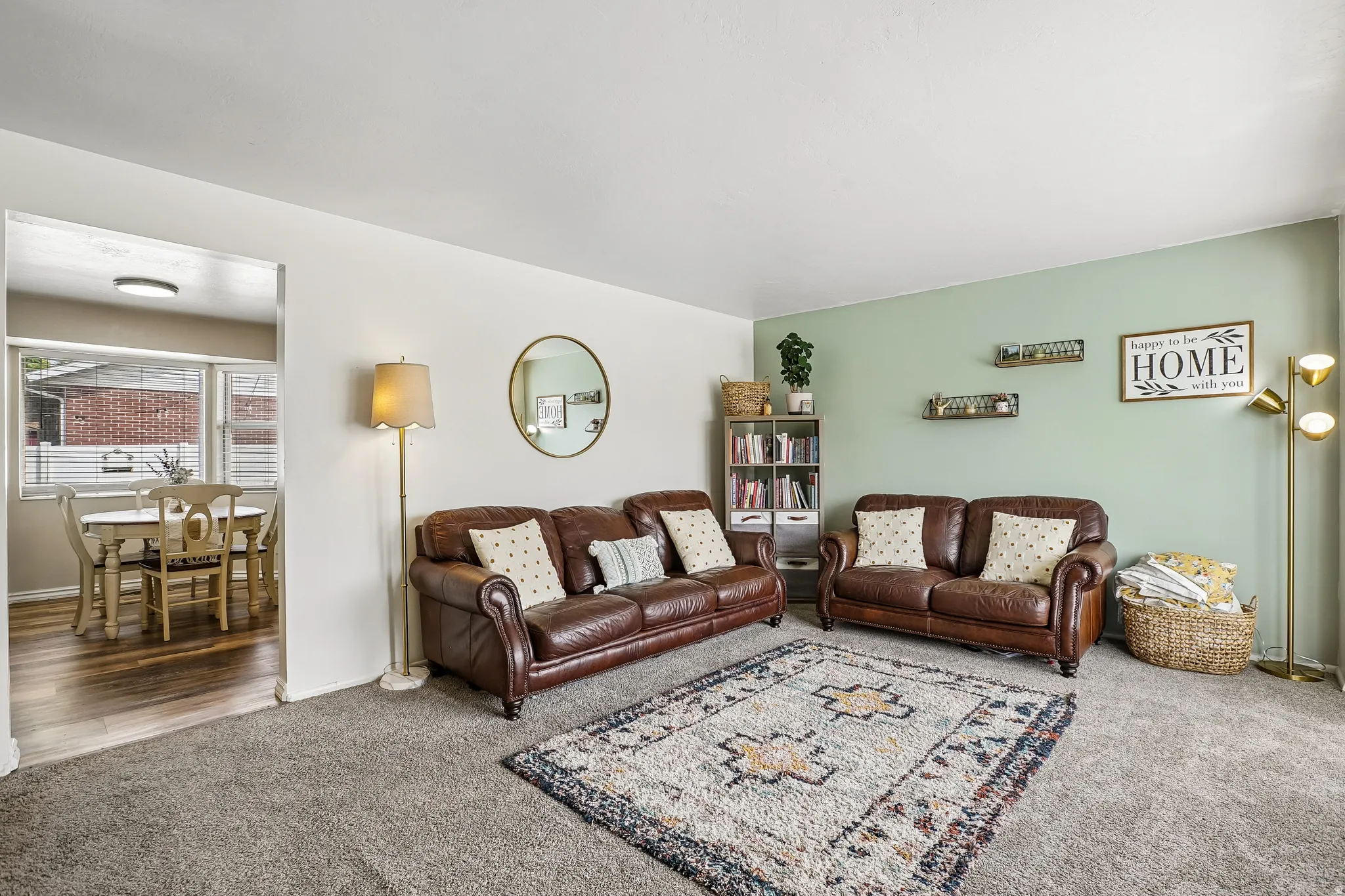 Living area with carpet and baseboards