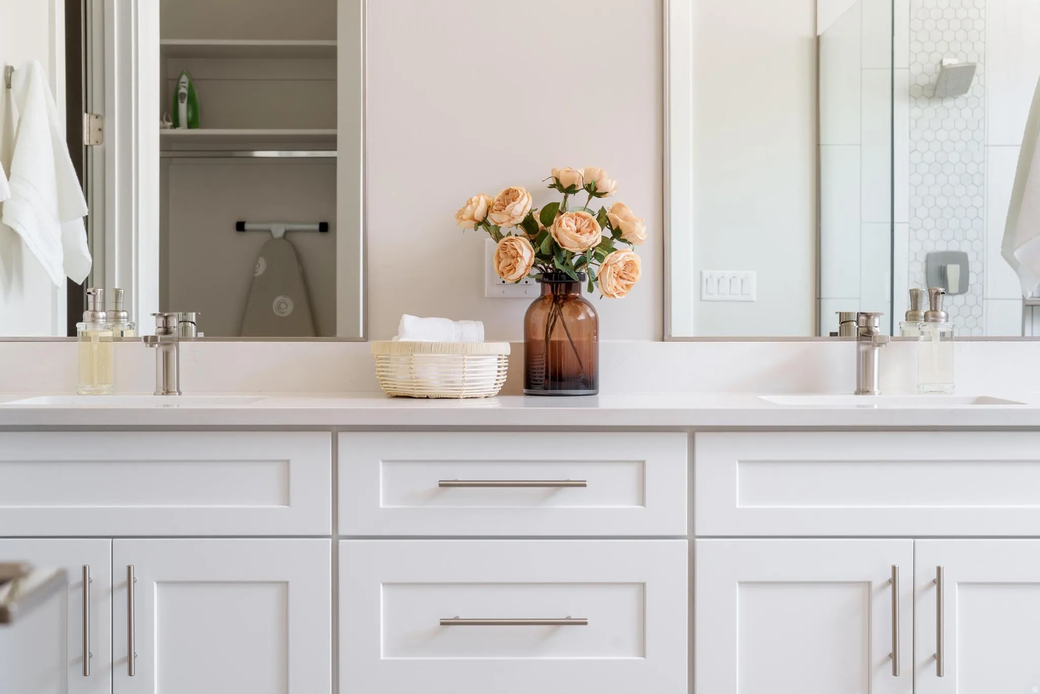 Full bath featuring double vanity