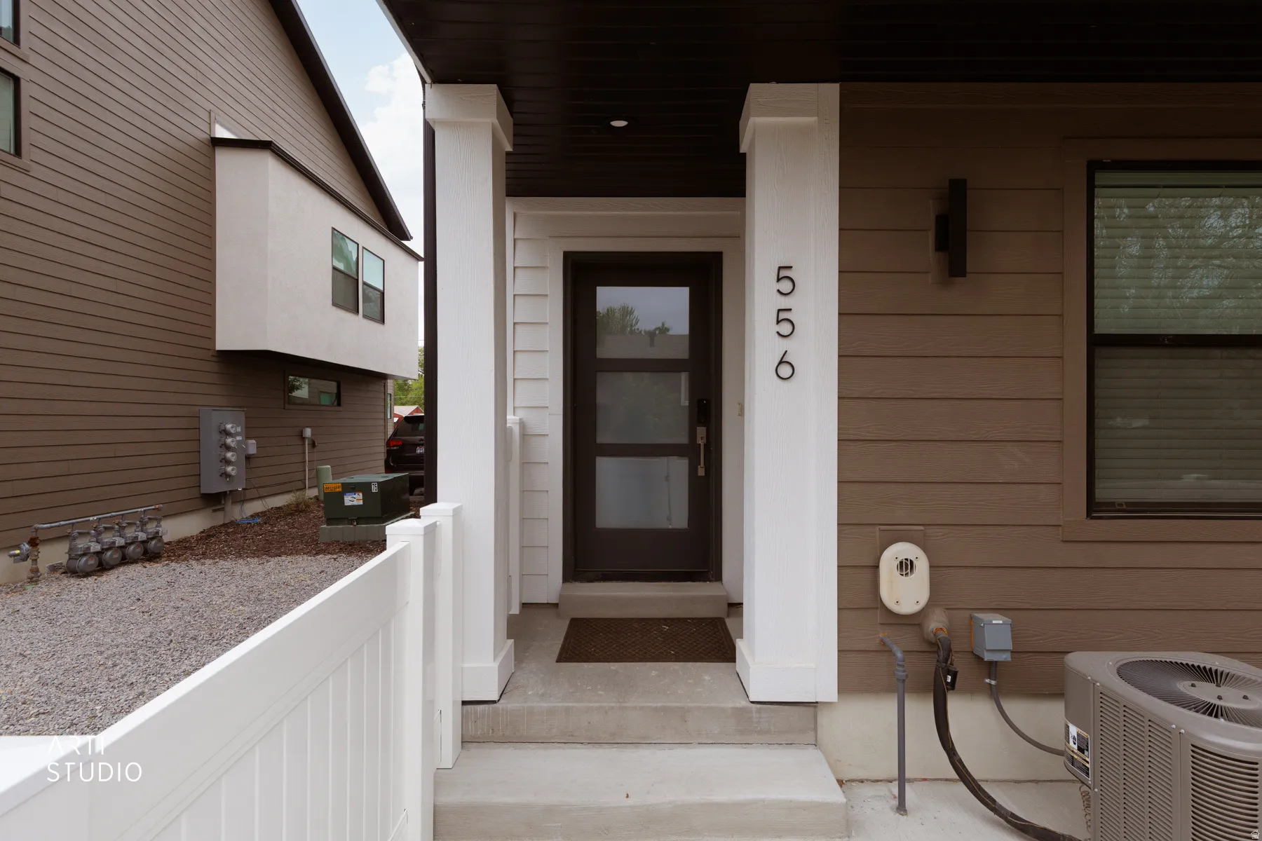 Property entrance featuring covered porch