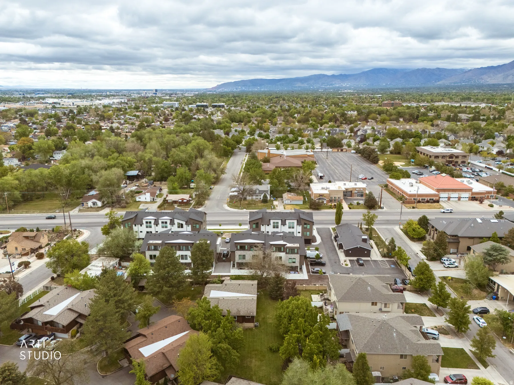 Aerial view of residential area with a mountain backdrop