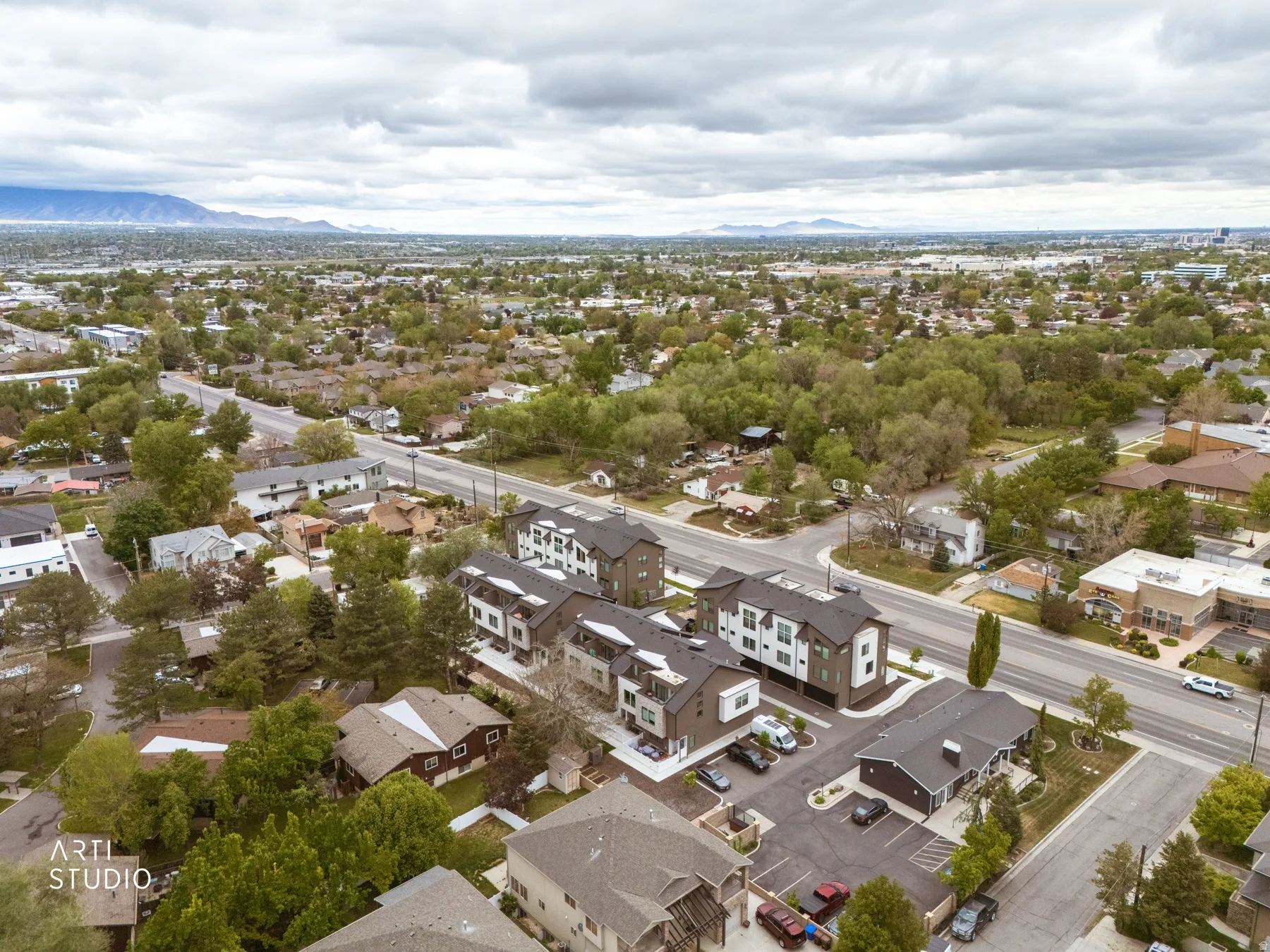 Aerial view of residential area with mountains