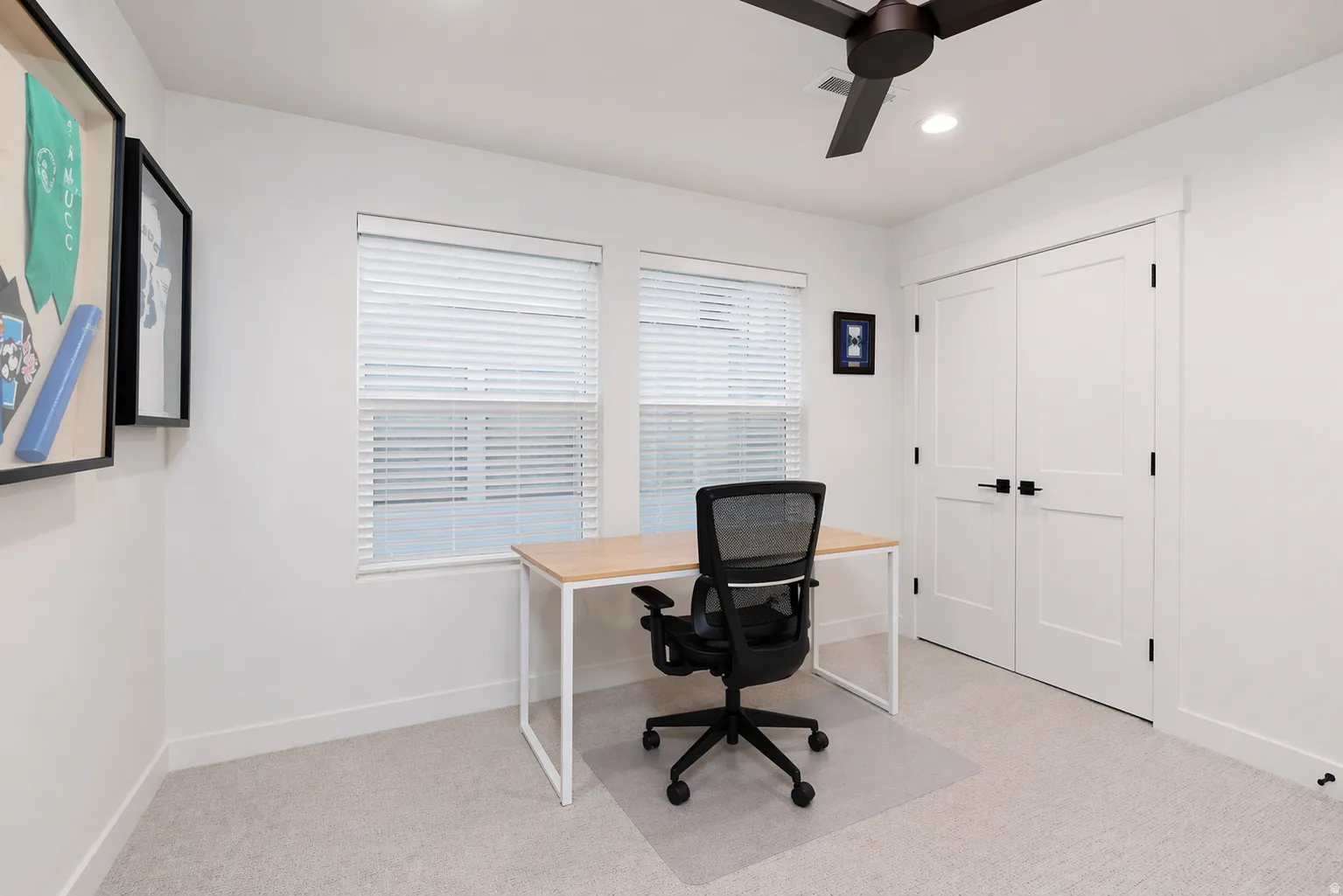 Office area with light colored carpet, a ceiling fan, and recessed lighting