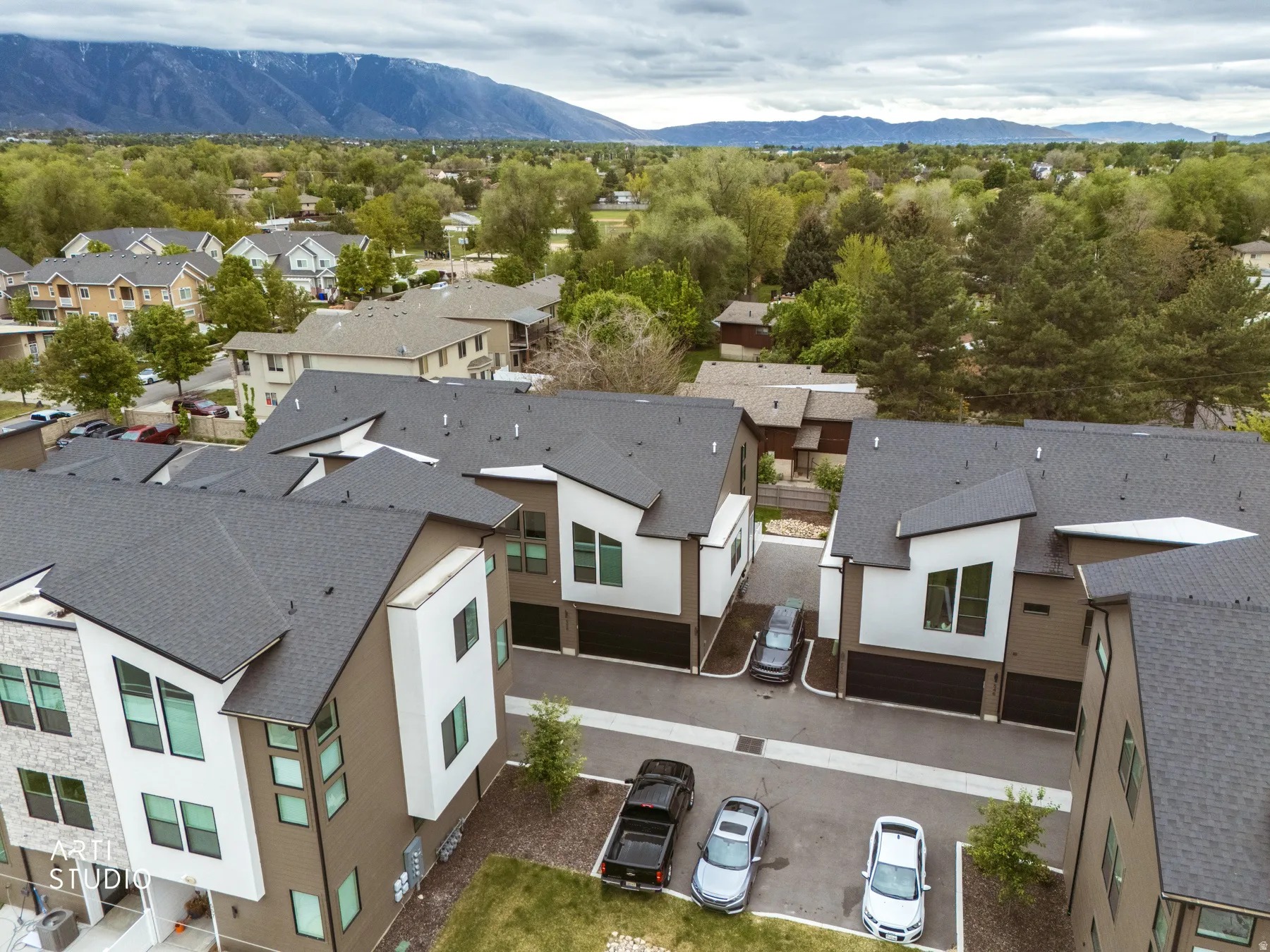 Aerial view of residential area with a mountainous background