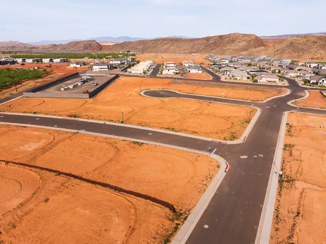 Aerial view of residential area featuring mountains