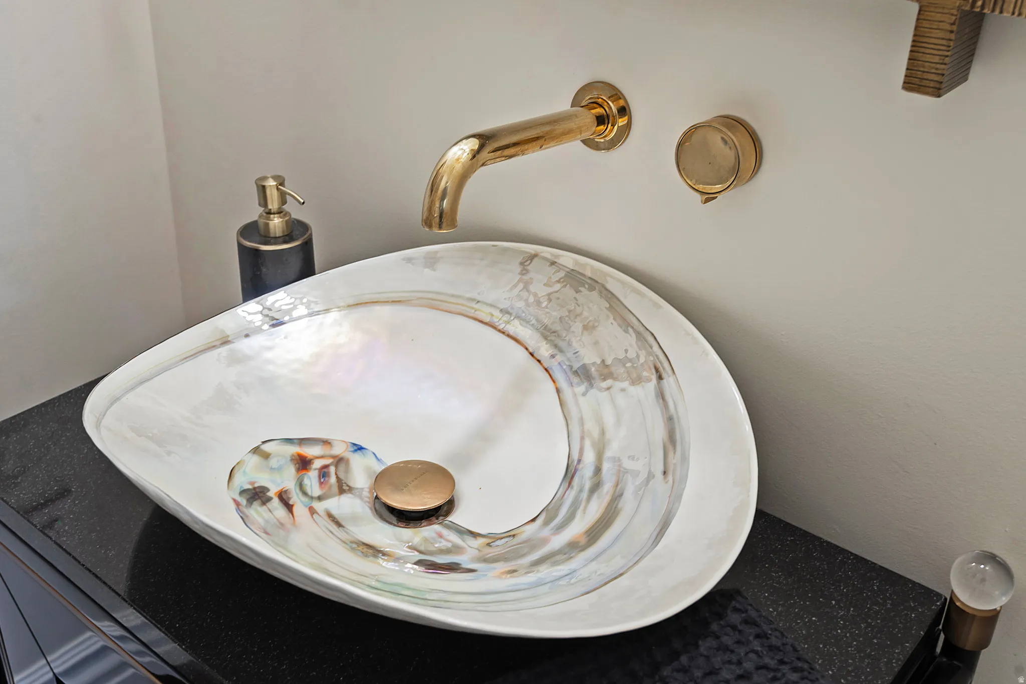 Guest bath with elegant fixtures.