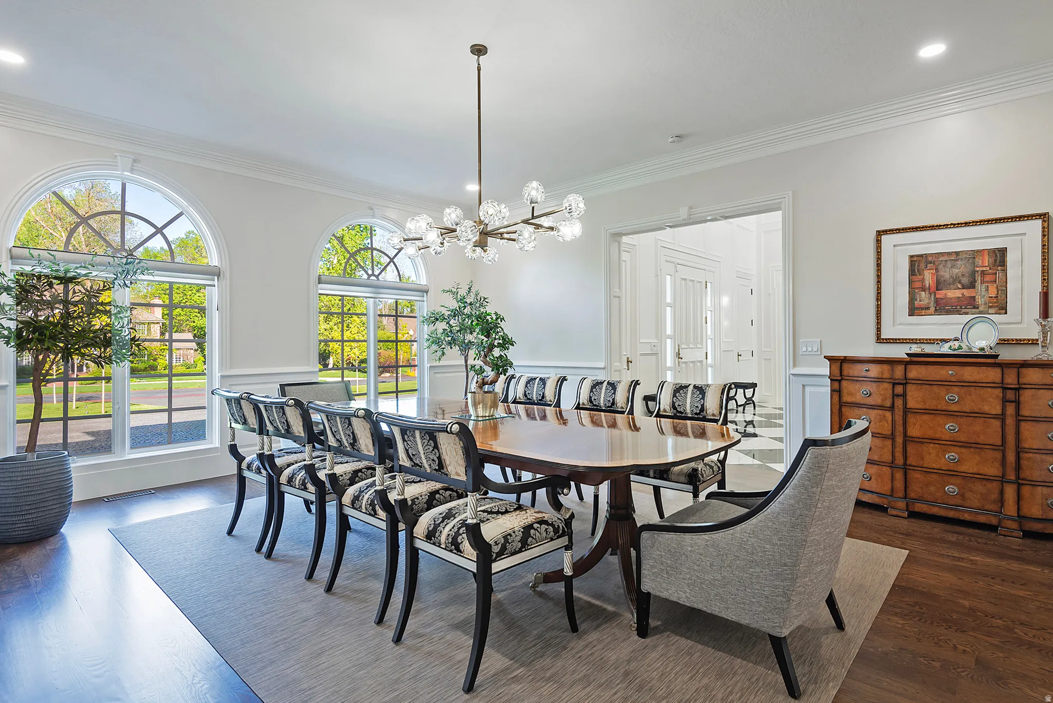 Elegant formal dining room offers exquisite detailing and is spacious enough for large dinner parties.