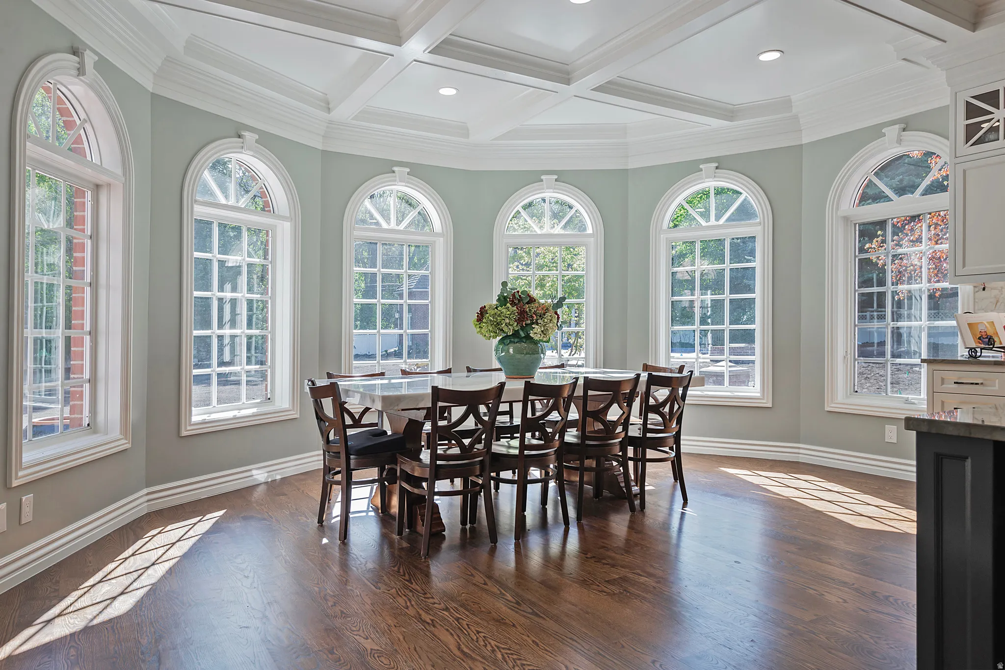Kitchen breakfast nook inspires cheerful casual dining with so much natural light.