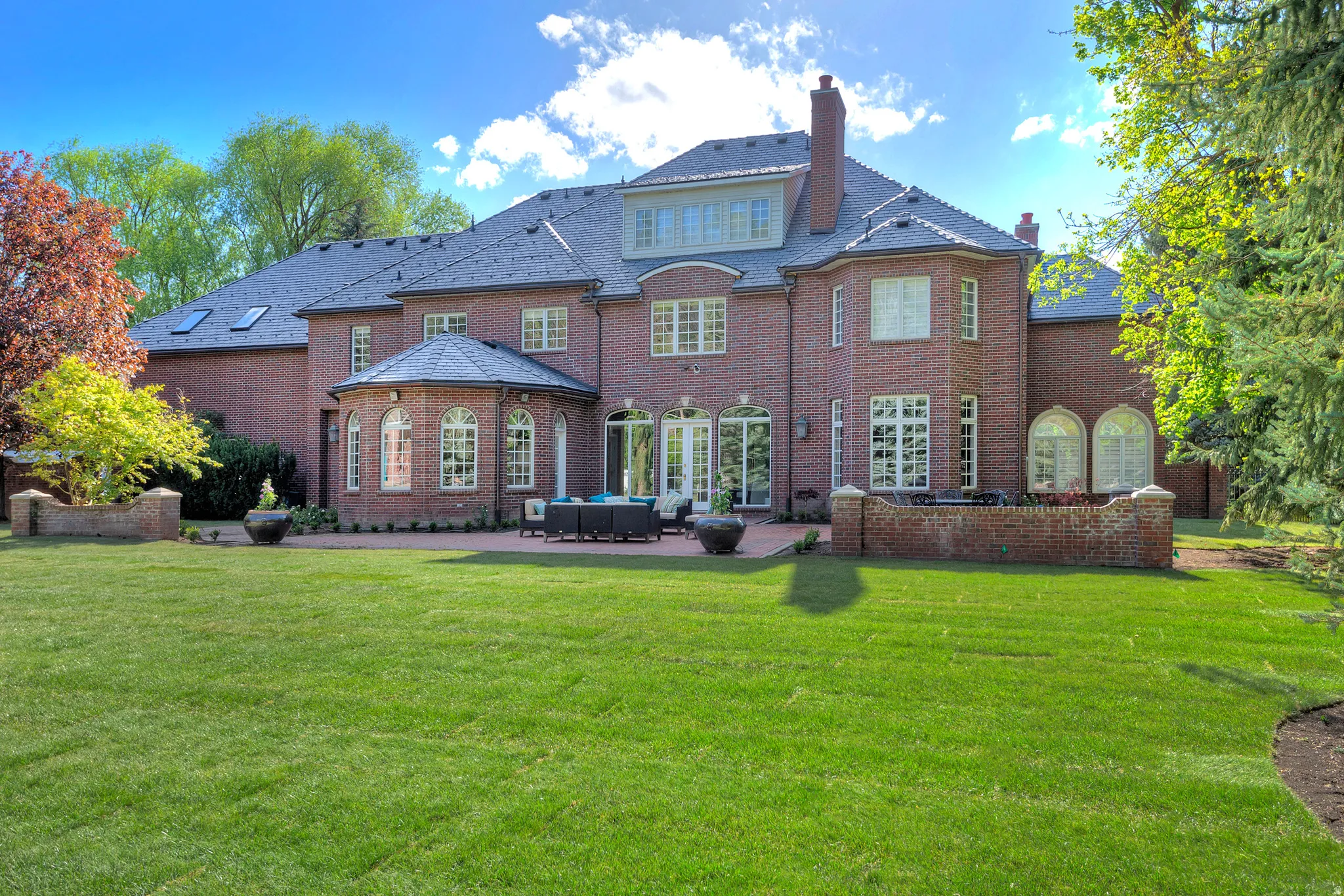 Huge backyard with new sod is private and secluded.